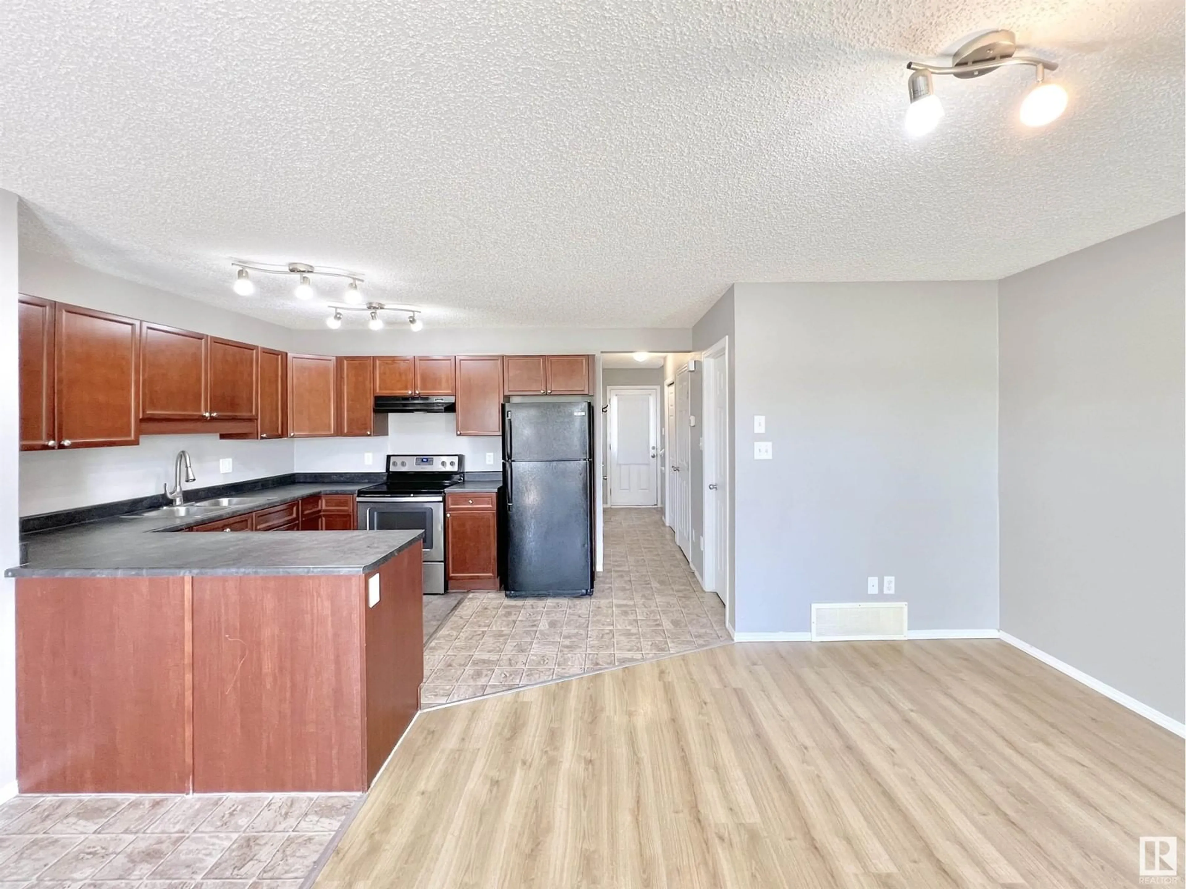 Open concept kitchen, unknown for #12 - 6304 SANDIN WY, Edmonton Alberta T6R0J8