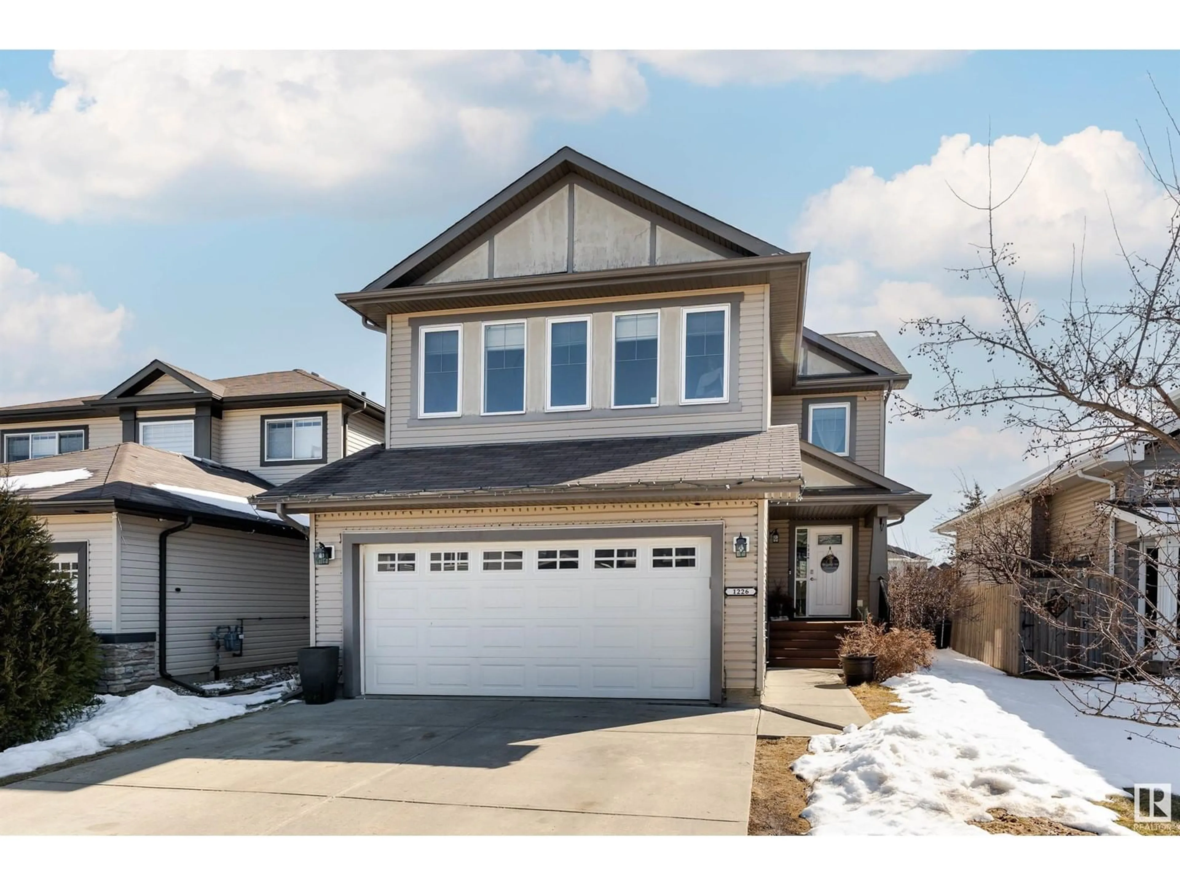 Home with vinyl exterior material, street for 1226 WESTERRA CR, Stony Plain Alberta T7Z0B2
