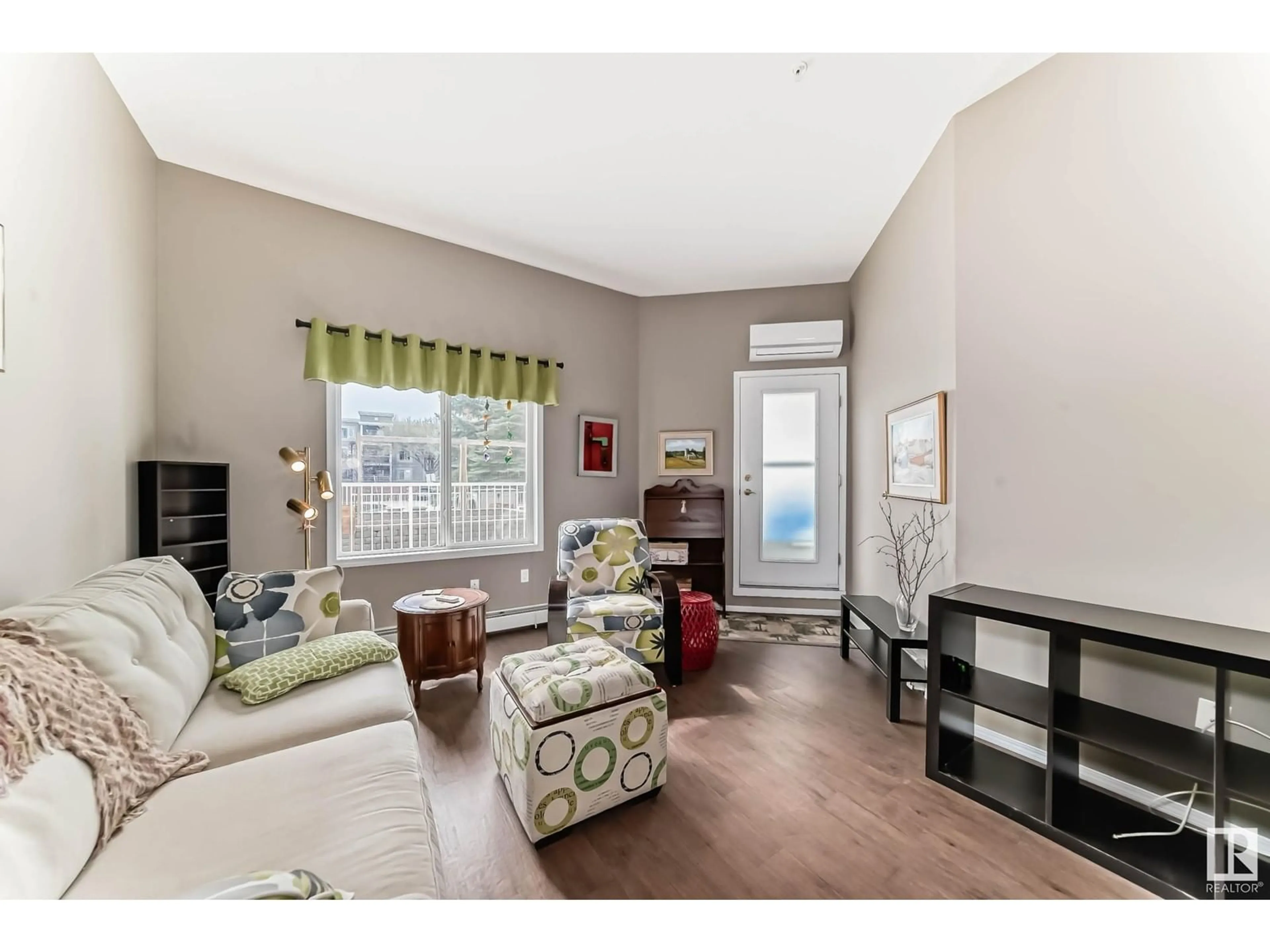 Living room with furniture, unknown for 78 - 134 MCKENNEY AV, St. Albert Alberta T8N1L9