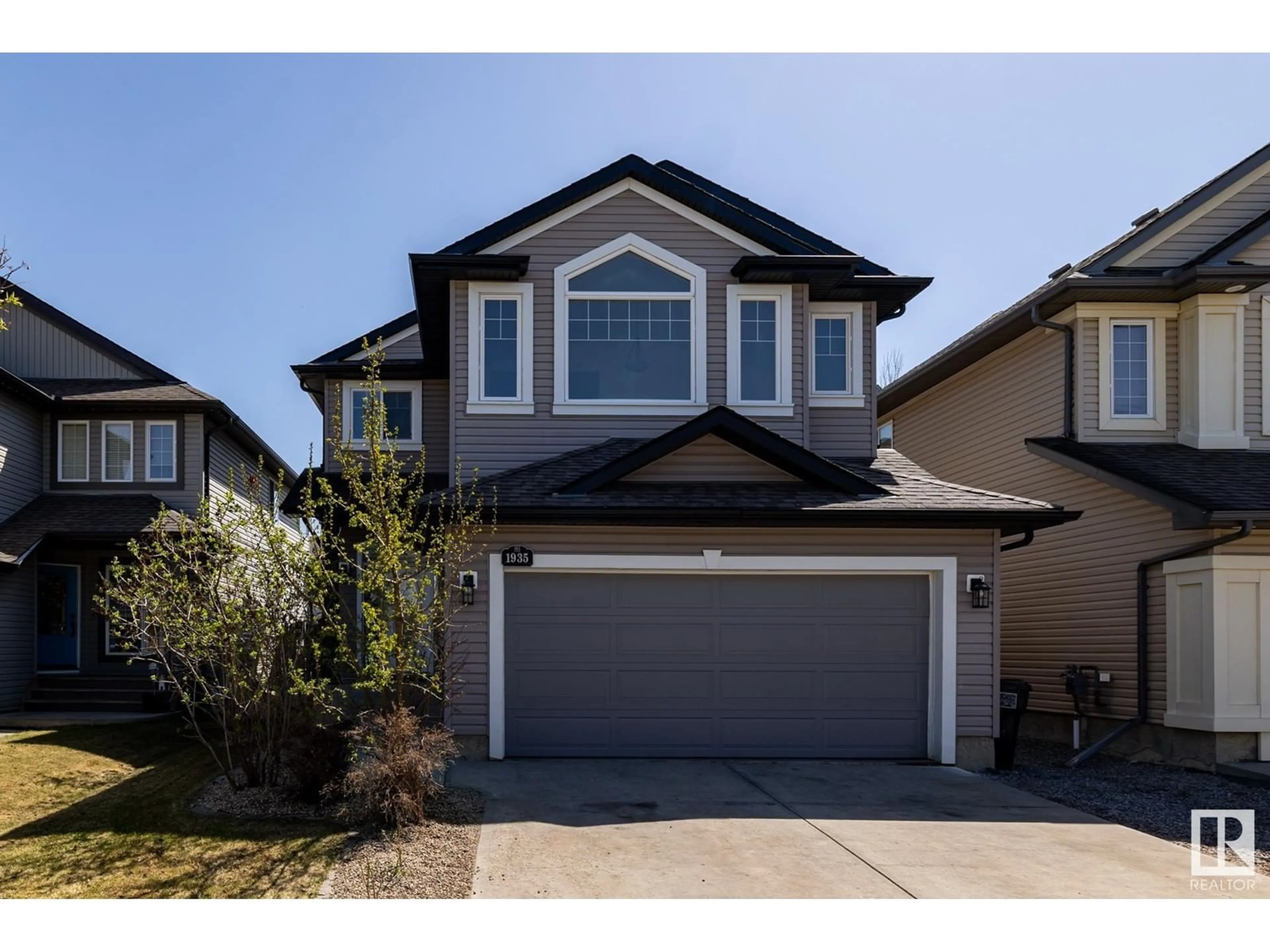Home with vinyl exterior material, street for SW SW - 1935 121 ST, Edmonton Alberta T6W0A6