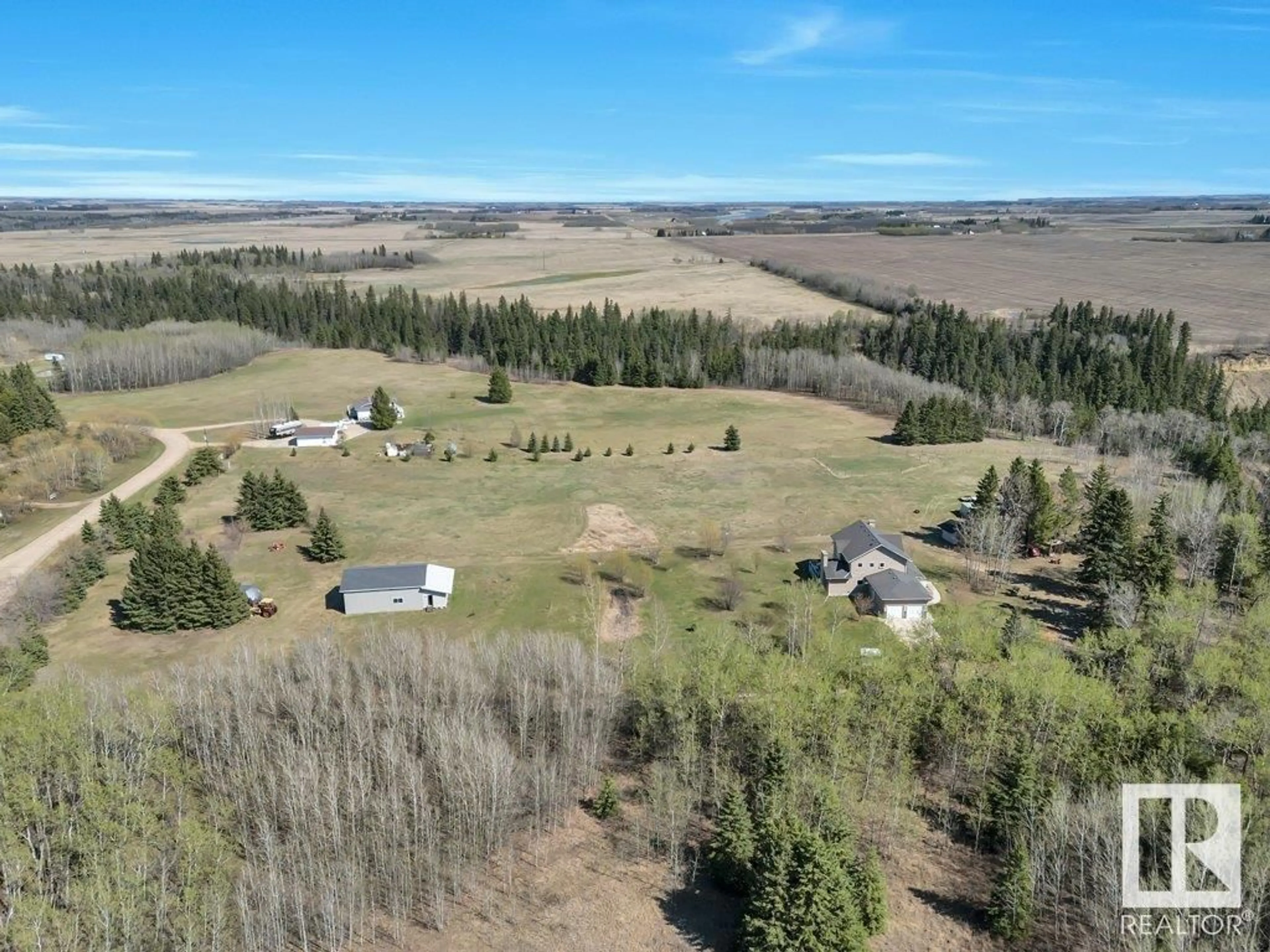 A pic from outside/outdoor area/front of a property/back of a property/a pic from drone, forest/trees view for 29 - 240073 TWP RD 471, Rural Wetaskiwin County Alberta T9A1X1