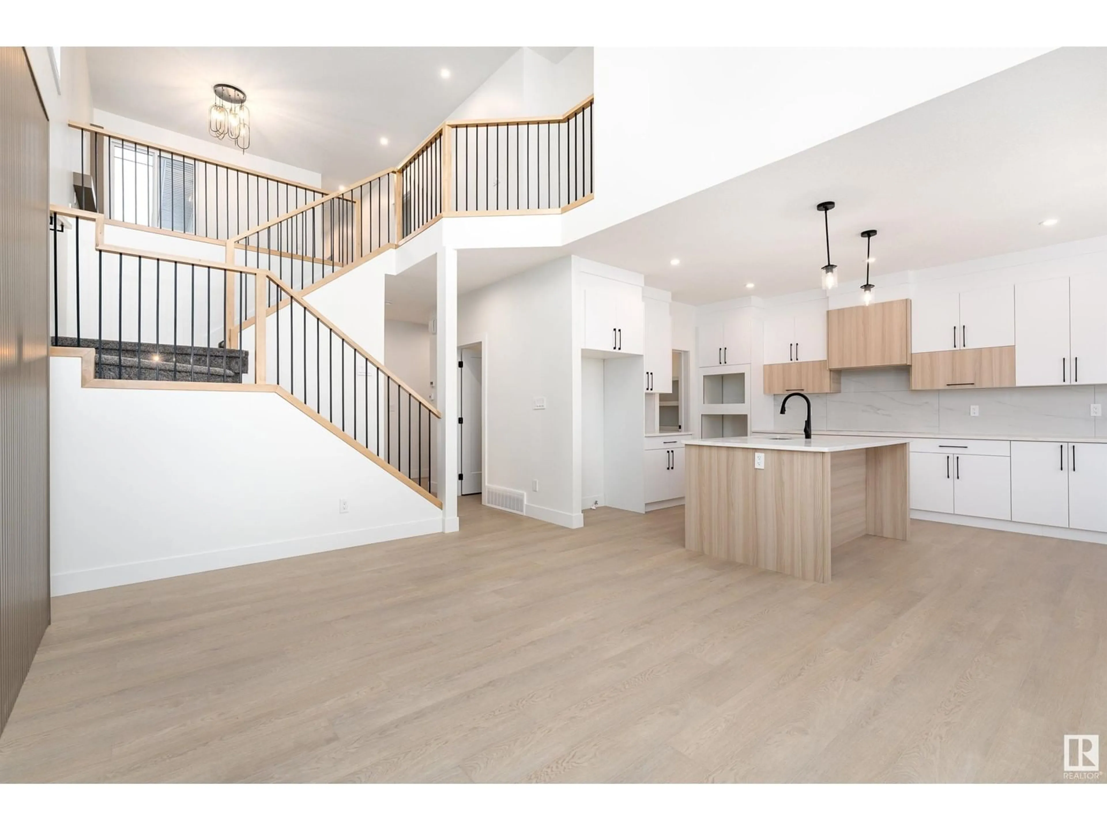 Open concept kitchen, wood/laminate floor for 64 EDGEFIELD WY, St. Albert Alberta T8N7Z9