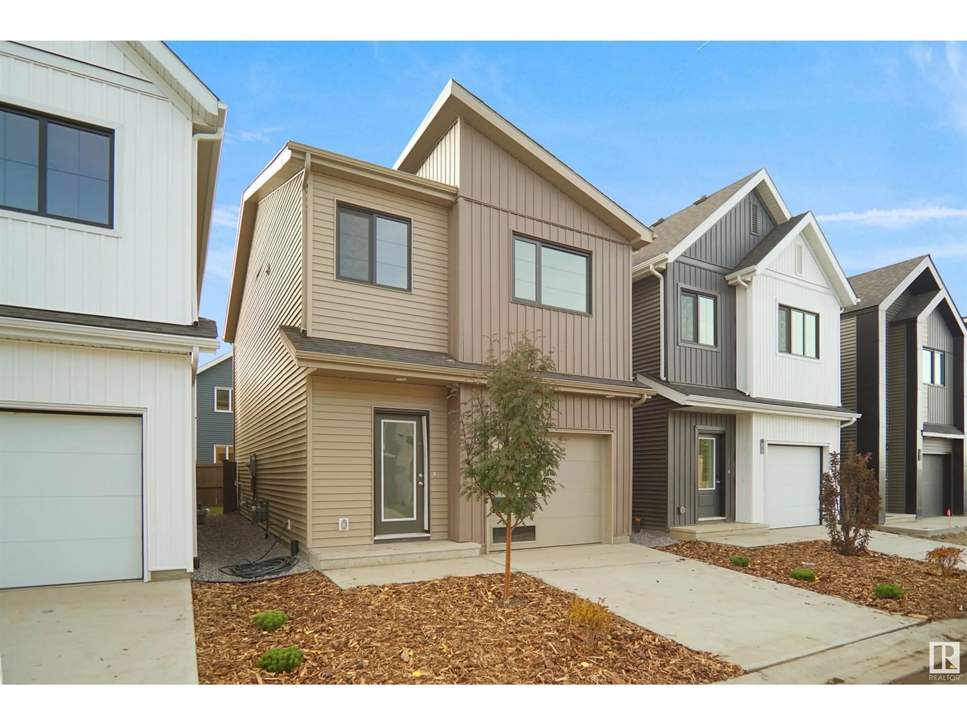 Home with vinyl exterior material, street for 21 - 1430 ASTER WY, Edmonton Alberta T6T2N8