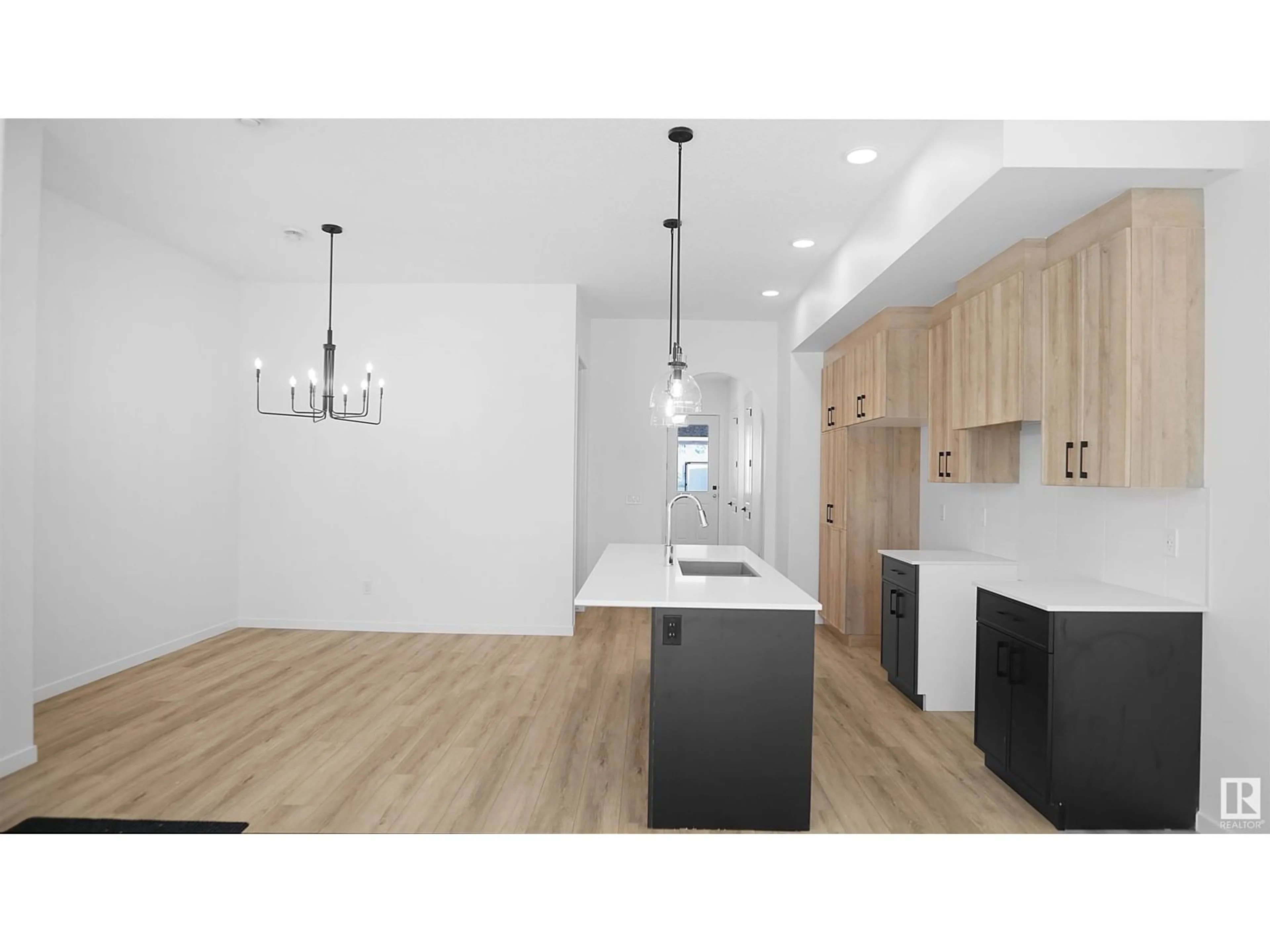 Open concept kitchen, wood/laminate floor for 15 DEER MEADOW CR, Fort Saskatchewan Alberta T8L0X9