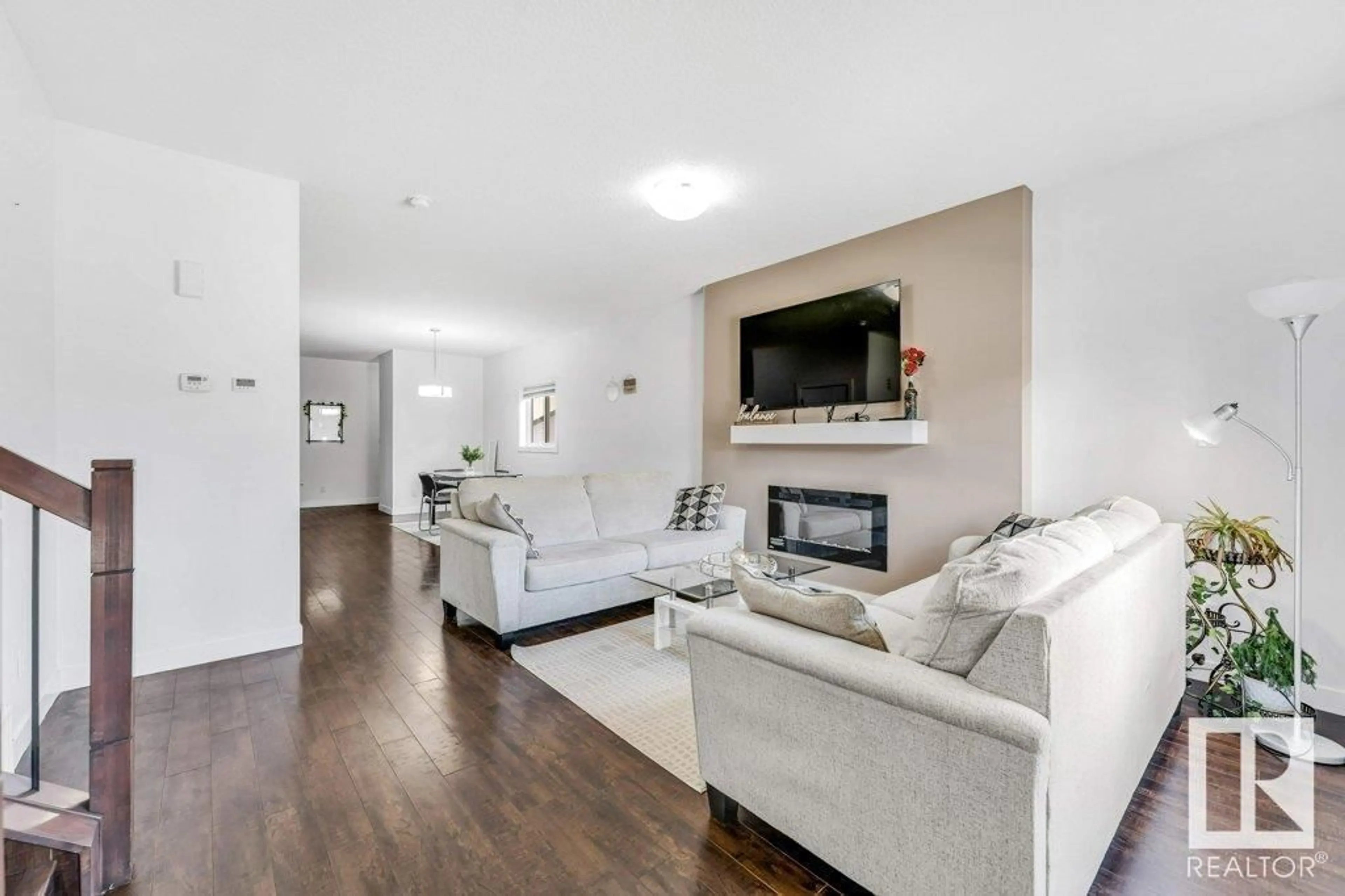 Living room with furniture, unknown for 9201 COOPER CR SW, Edmonton Alberta T6W3L1