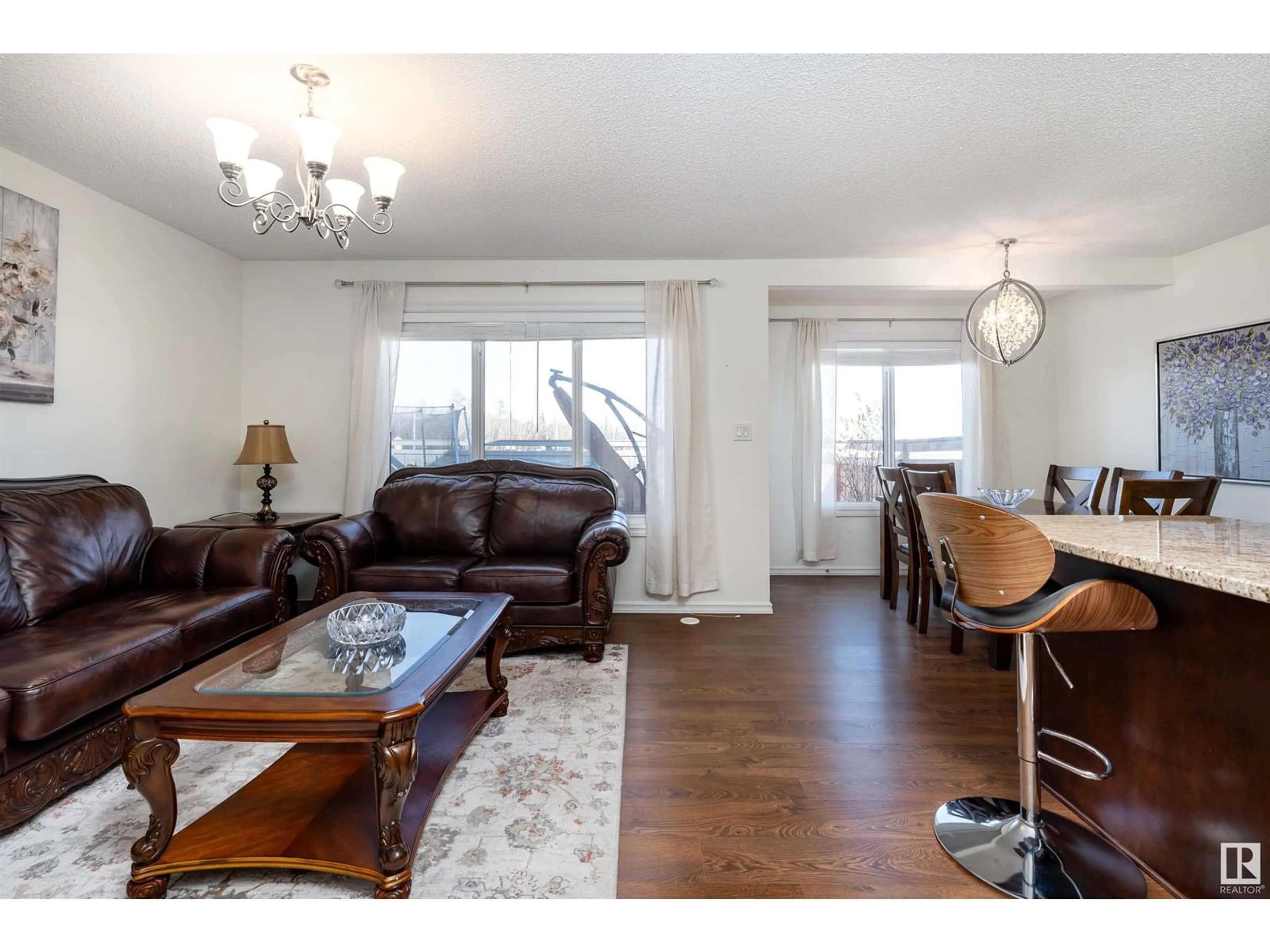 Living room with furniture, wood/laminate floor for 2885 DUKE CR, Edmonton Alberta T6W3Y4