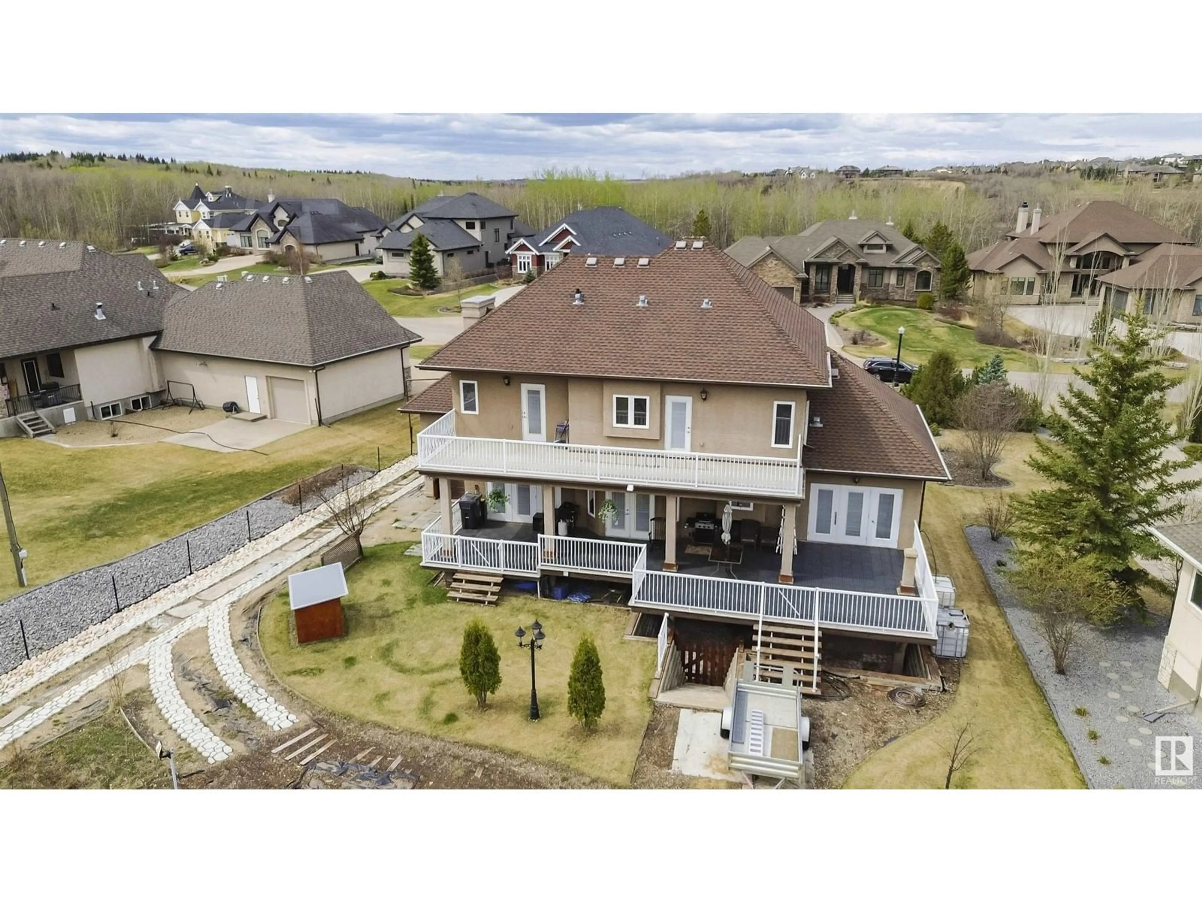 A pic from outside/outdoor area/front of a property/back of a property/a pic from drone, mountain view for 55 24524 TWP ROAD 544, Rural Sturgeon County Alberta T8T1S2