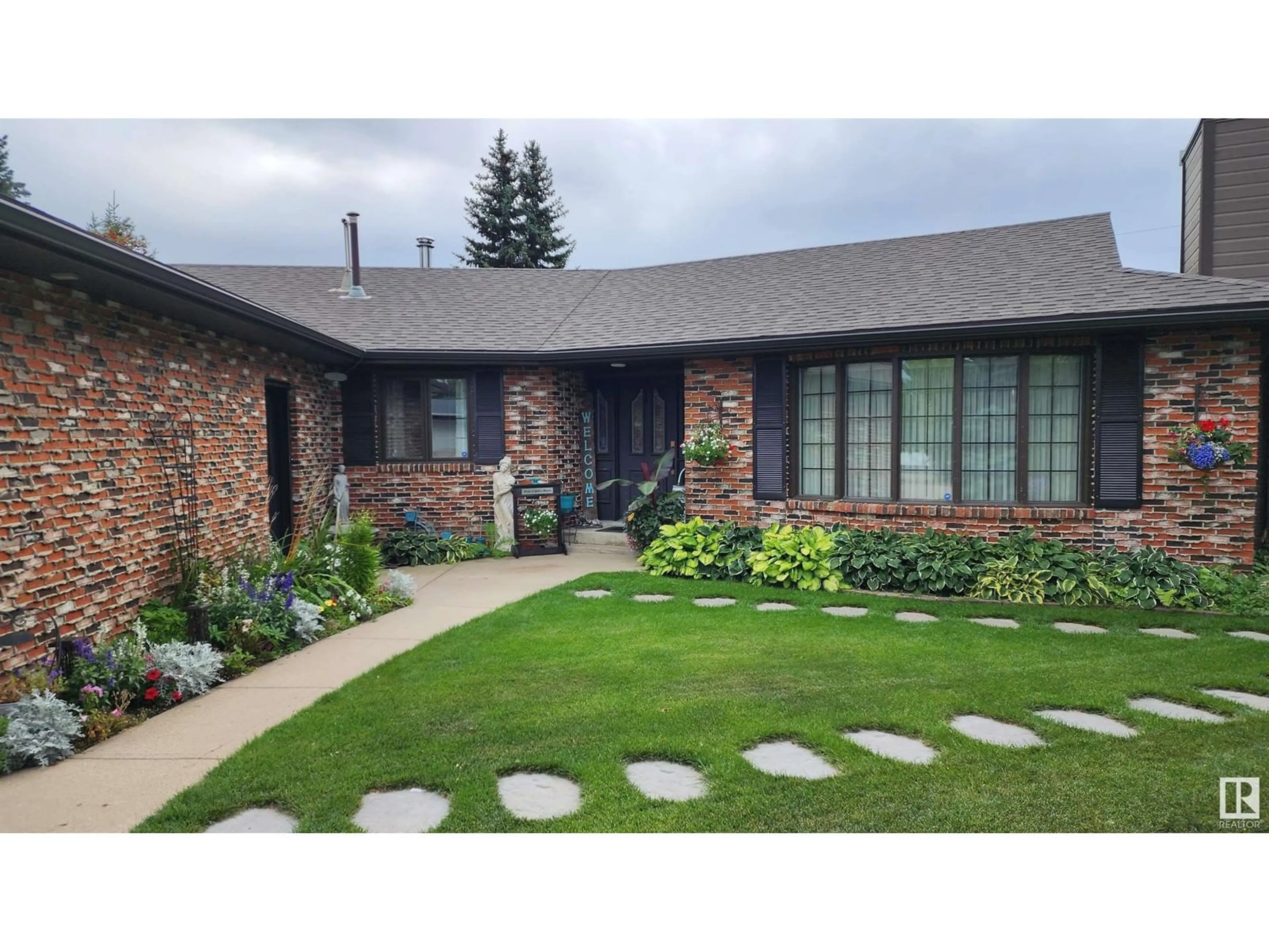 Home with brick exterior material, street for 5307 RAVINE DR, Elk Point Alberta T0A1A0