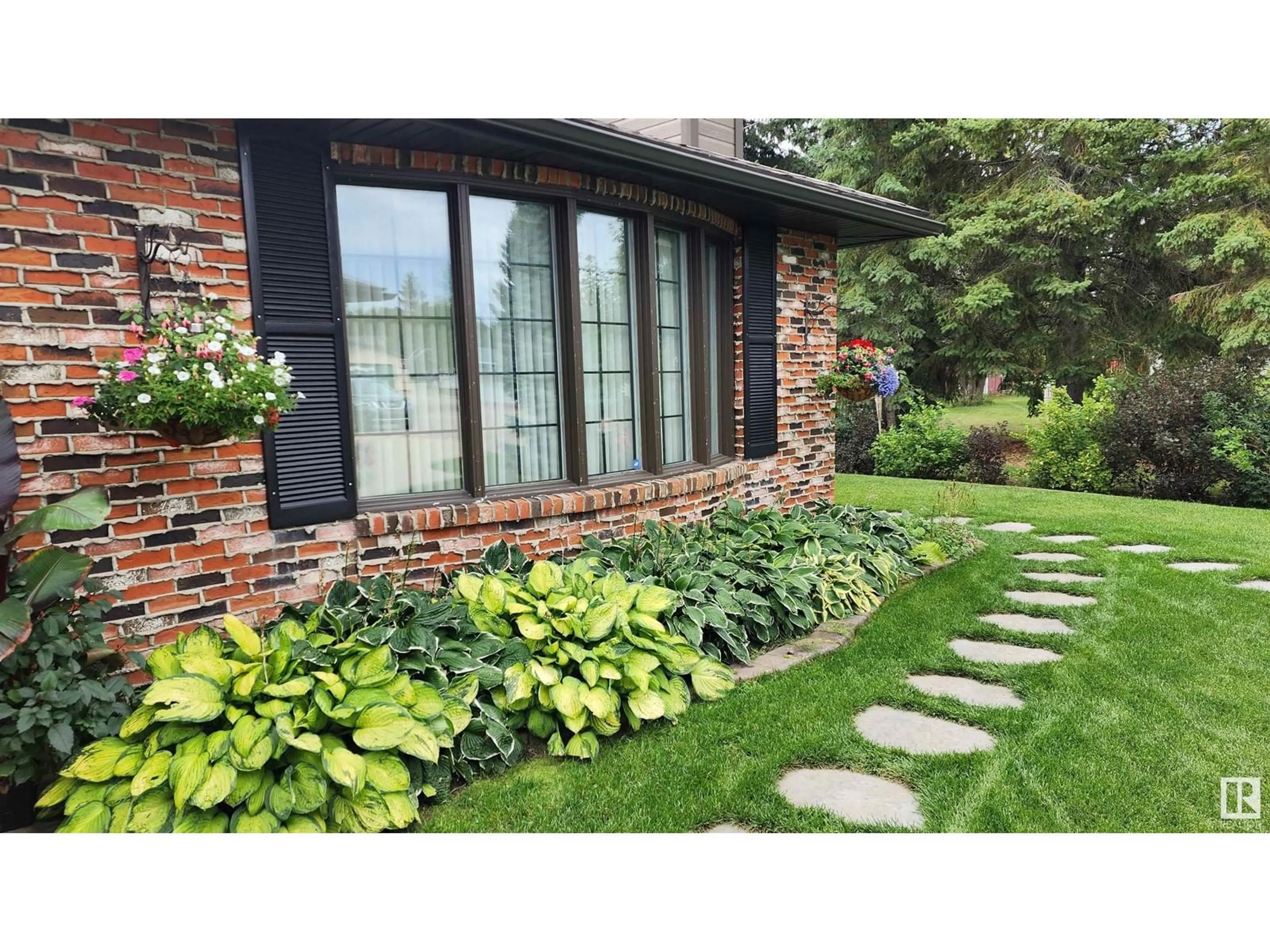 Home with brick exterior material, street for 5307 RAVINE DR, Elk Point Alberta T0A1A0