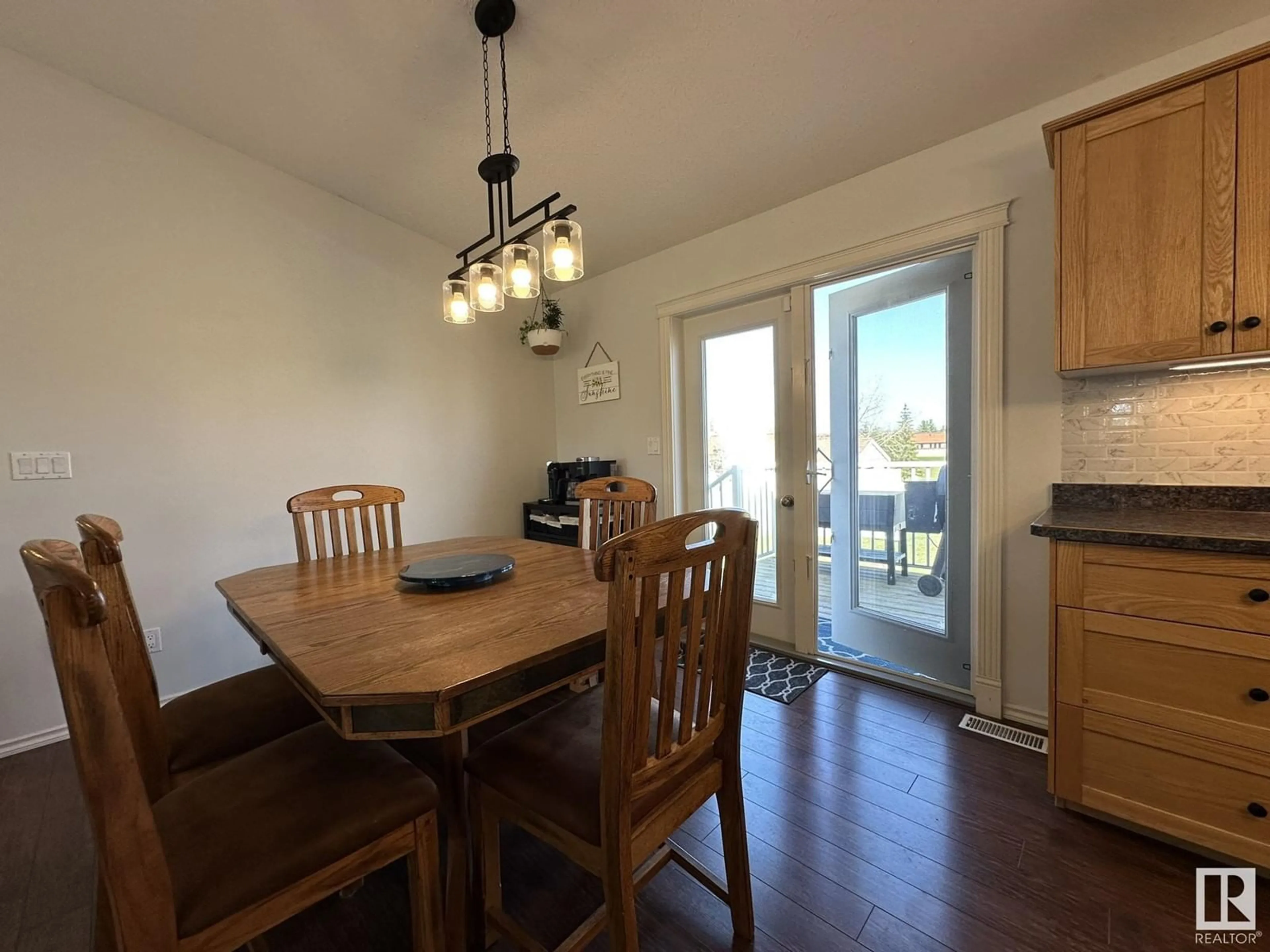 Dining room, wood/laminate floor for 5601 55 ST, Smoky Lake Town Alberta T0A3C0