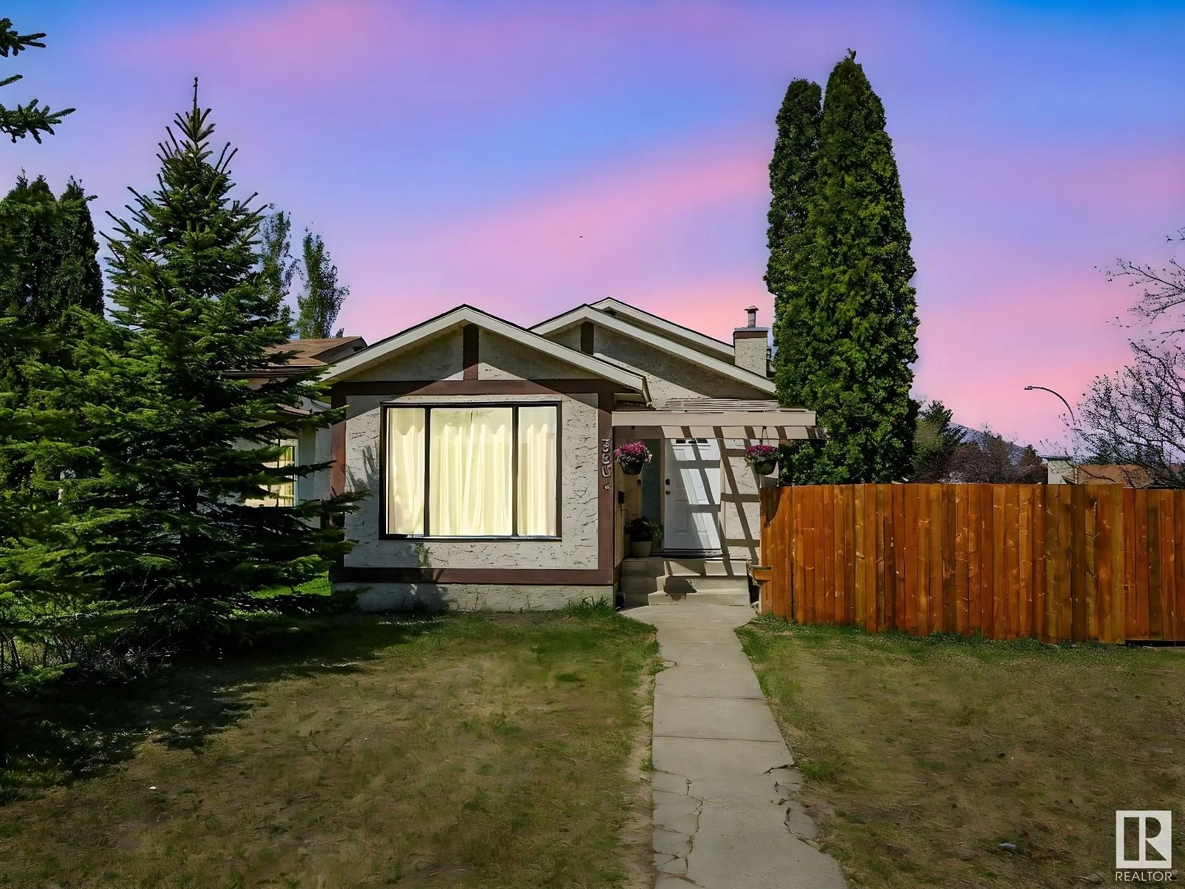 Home with vinyl exterior material, street for 3604 17 AV, Edmonton Alberta T6L2N6