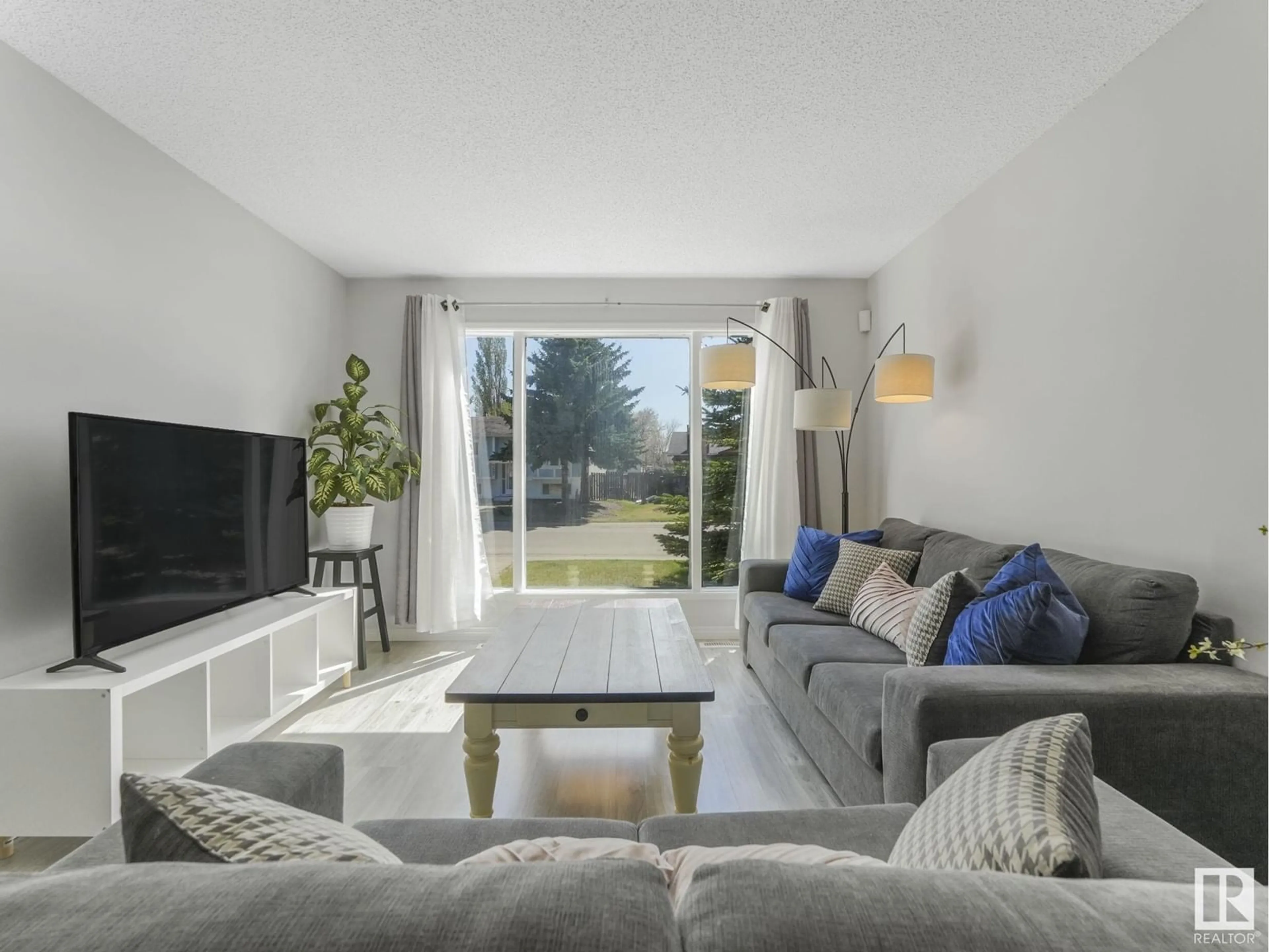 Living room with furniture, unknown for 3604 17 AV, Edmonton Alberta T6L2N6