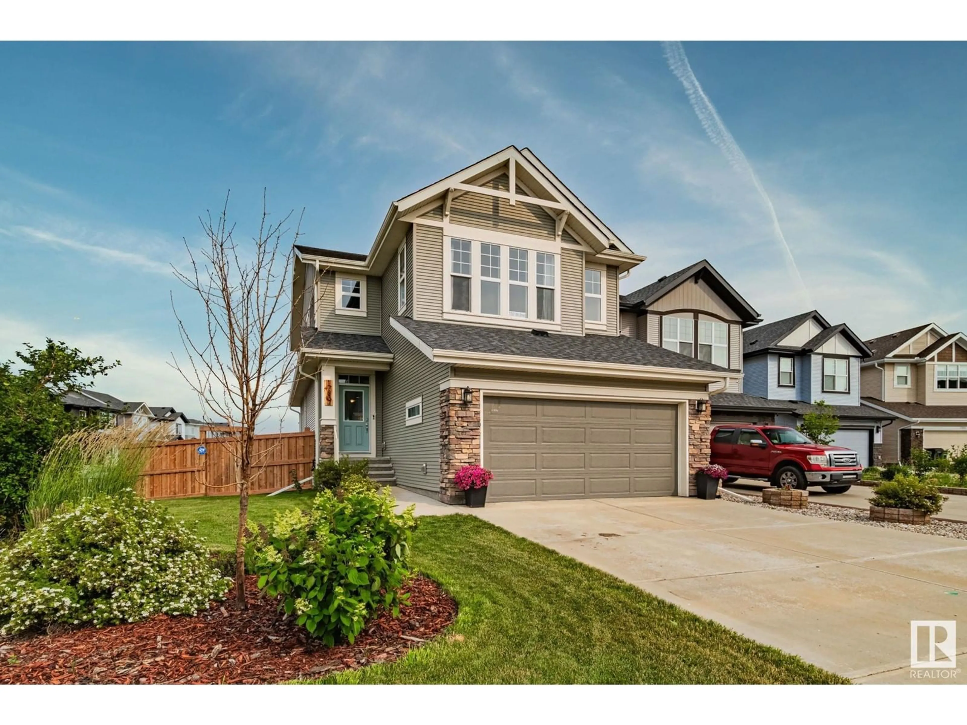 Home with vinyl exterior material, street for NW - 17837 60A ST, Edmonton Alberta T5Y3T2