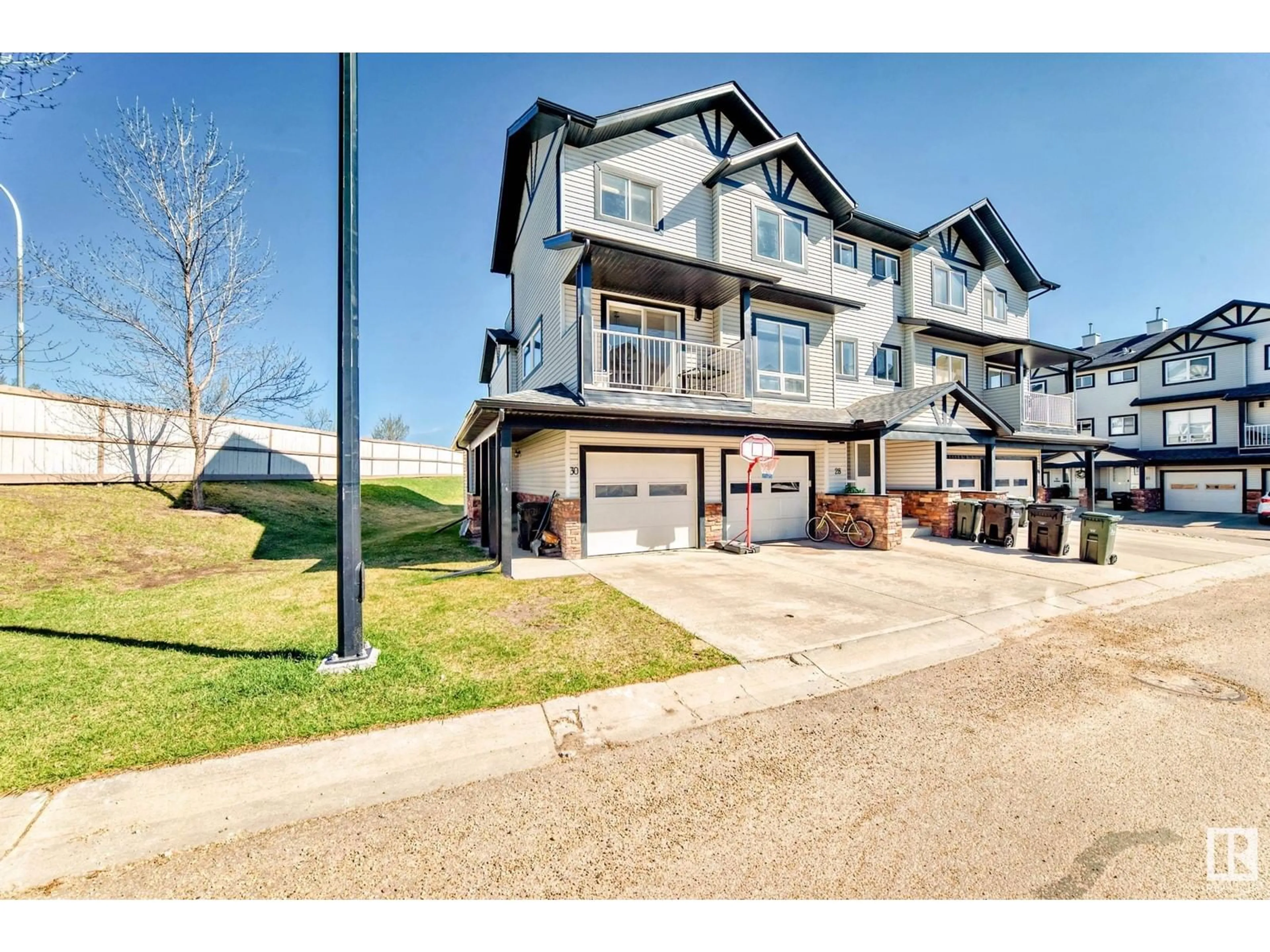 A pic from outside/outdoor area/front of a property/back of a property/a pic from drone, unknown for 11 - 30 CLOVER BAR LN, Sherwood Park Alberta T8H0C4
