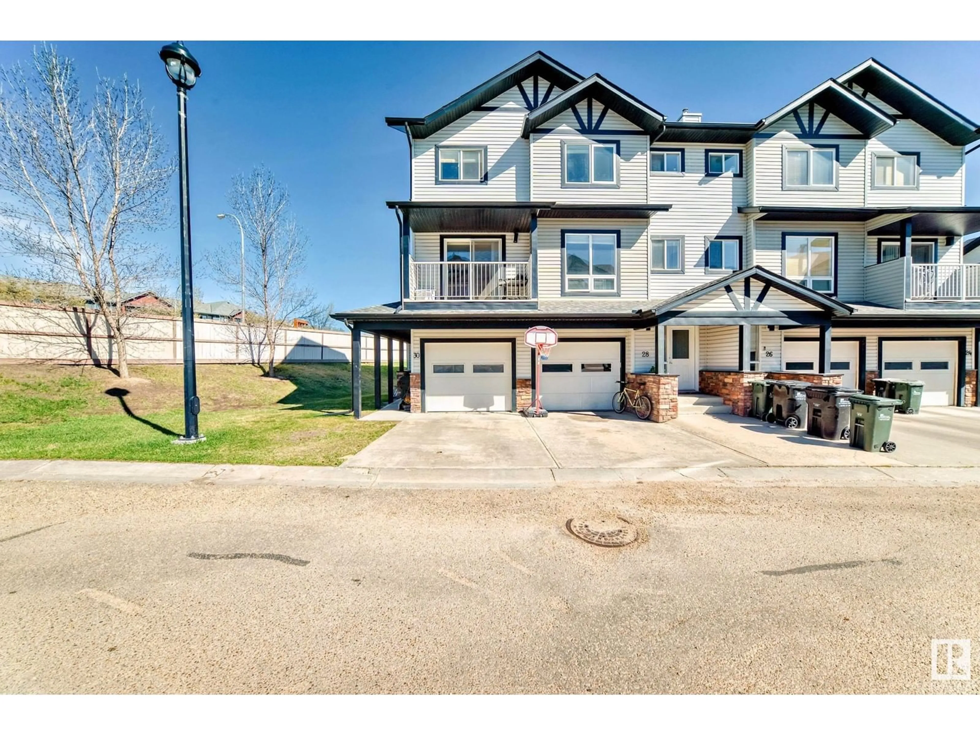 A pic from outside/outdoor area/front of a property/back of a property/a pic from drone, water/lake/river/ocean view for 11 - 30 CLOVER BAR LN, Sherwood Park Alberta T8H0C4
