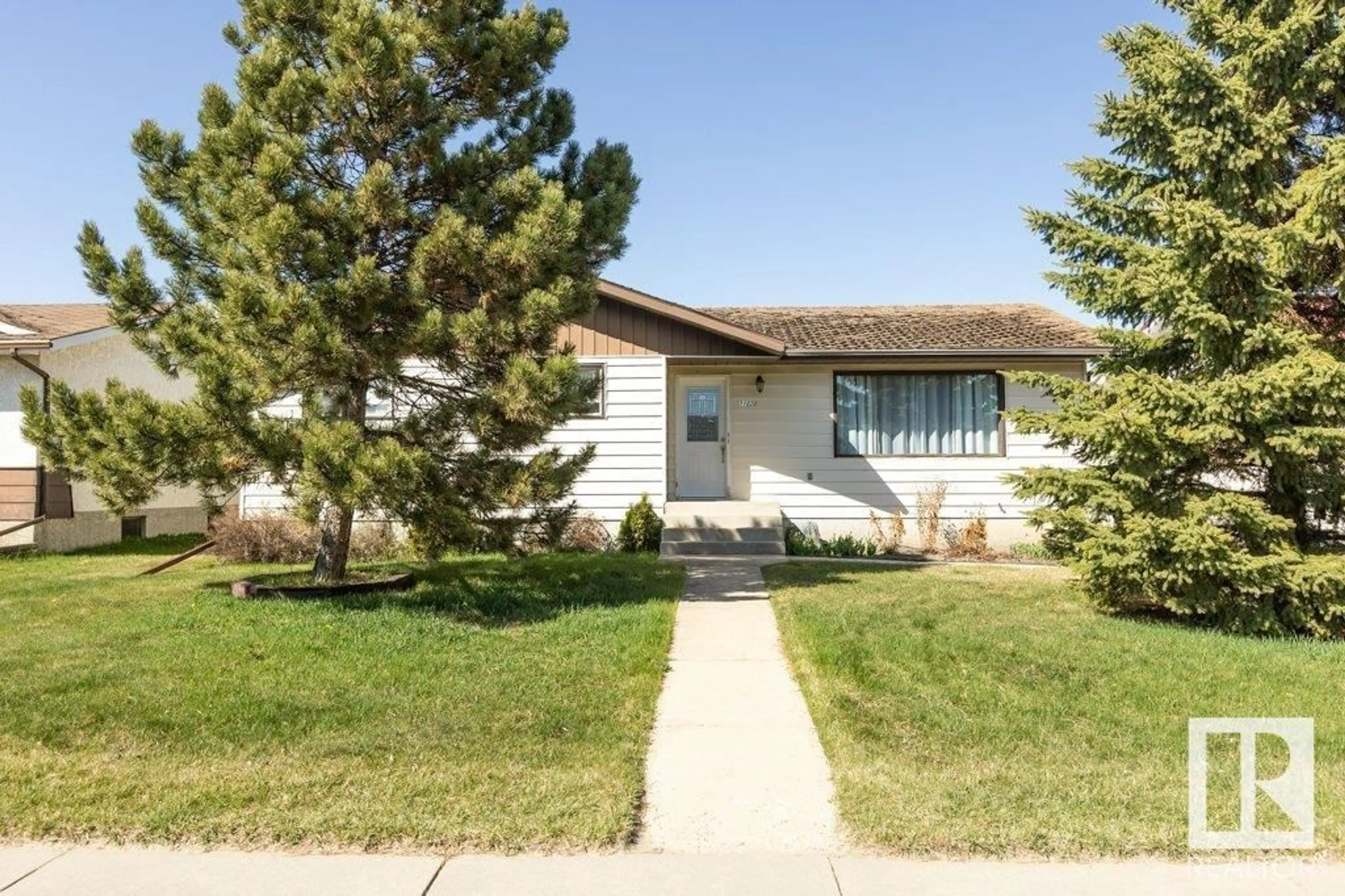 Home with vinyl exterior material, street for 11020 103A ST, Westlock Alberta T7P2N7