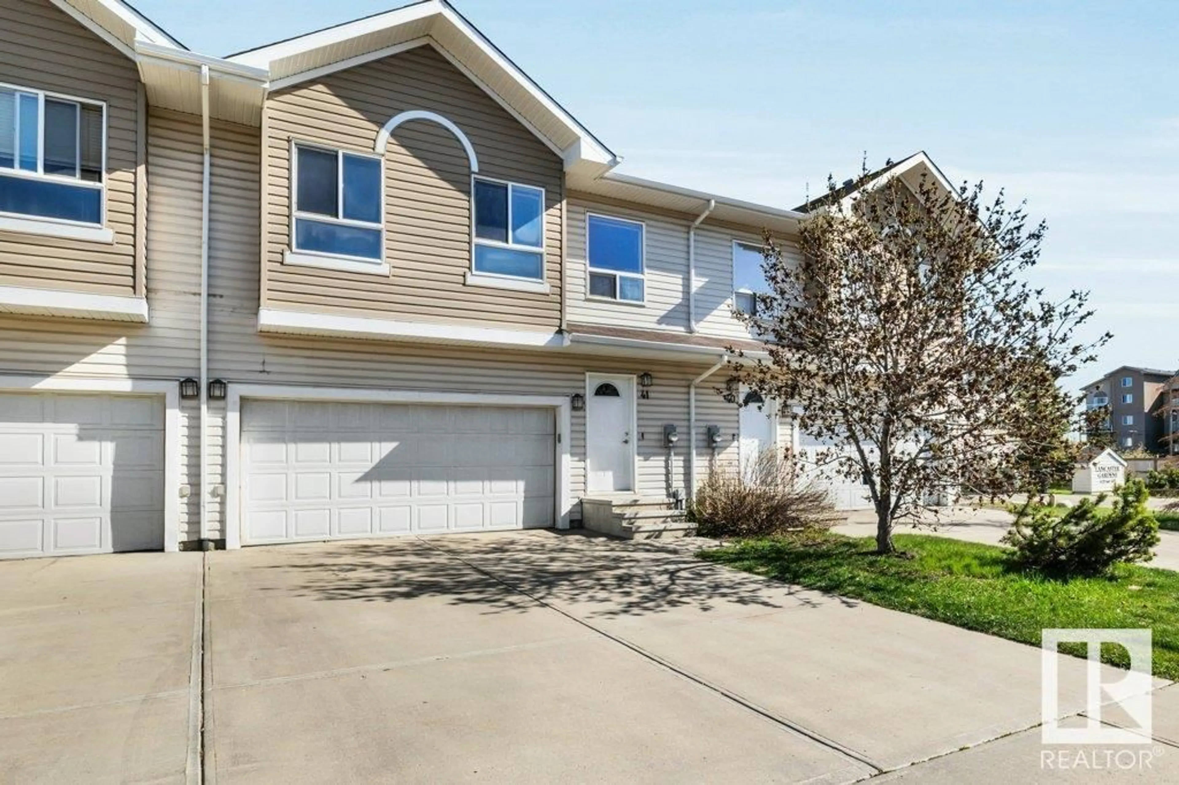 Home with vinyl exterior material, street for #41 - 5120 164 AV, Edmonton Alberta T5Y0L7