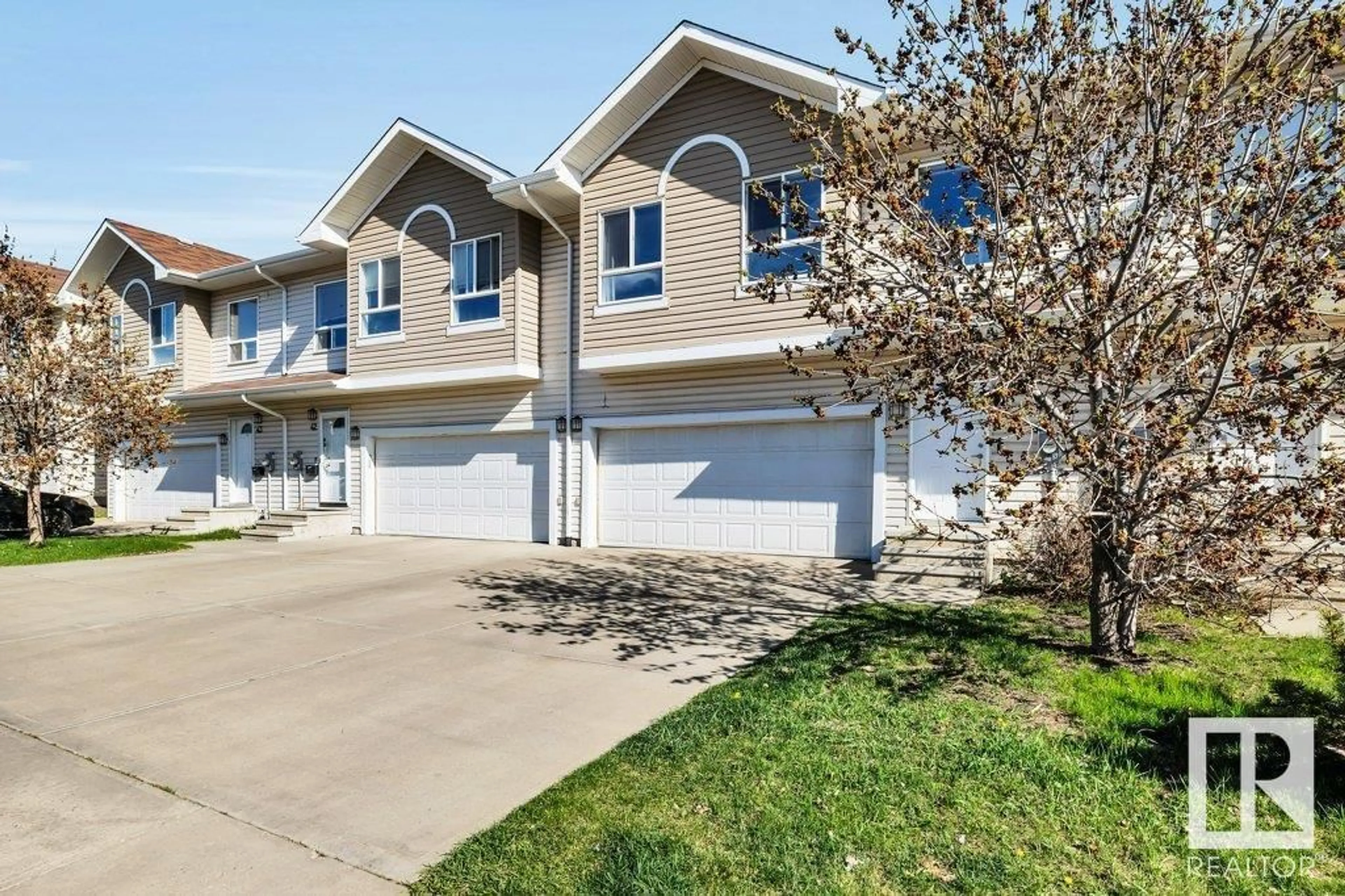 Home with vinyl exterior material, street for #41 - 5120 164 AV, Edmonton Alberta T5Y0L7