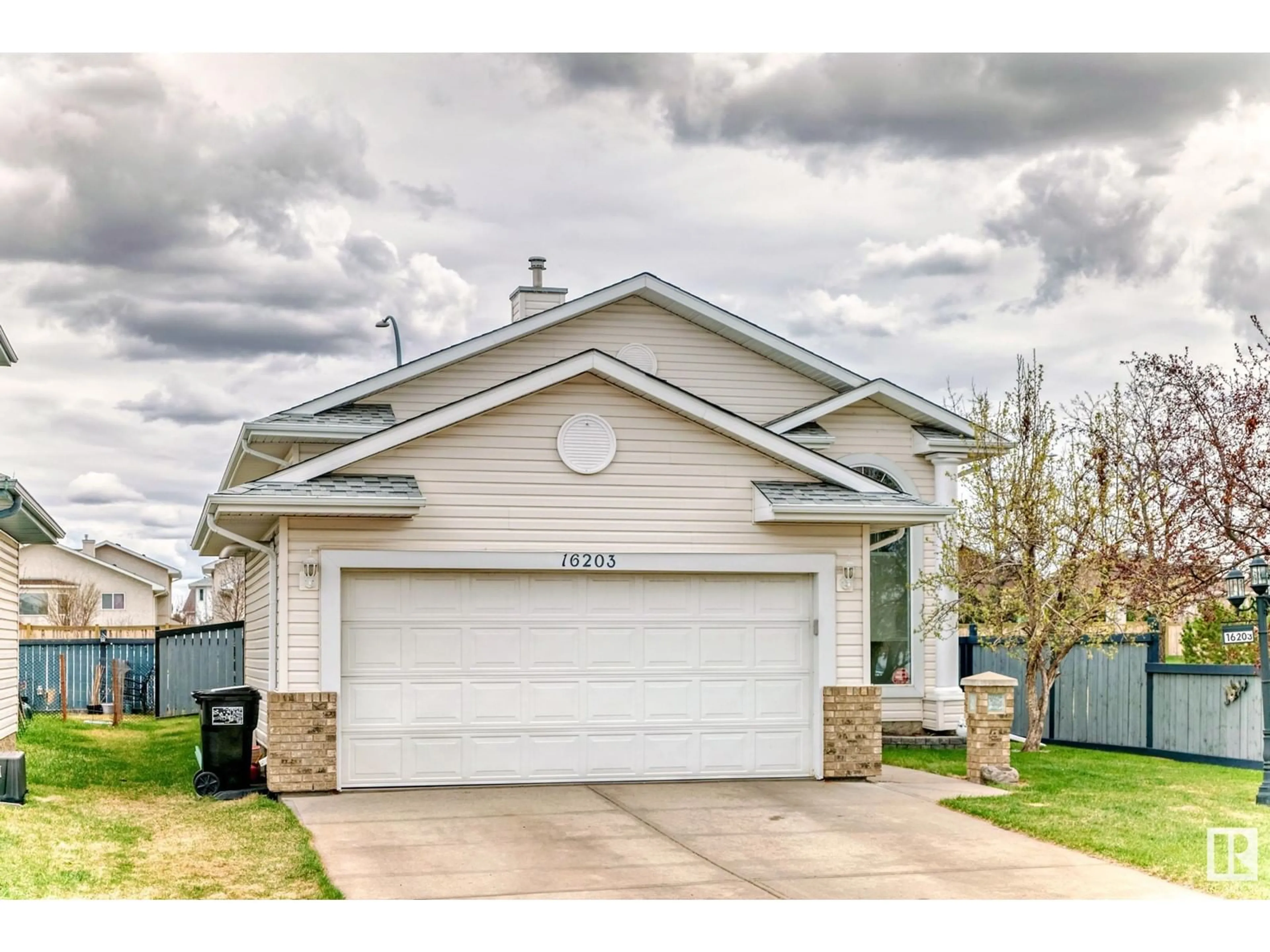 Home with vinyl exterior material, street for NW - 16203 83 ST, Edmonton Alberta T5Z3L5