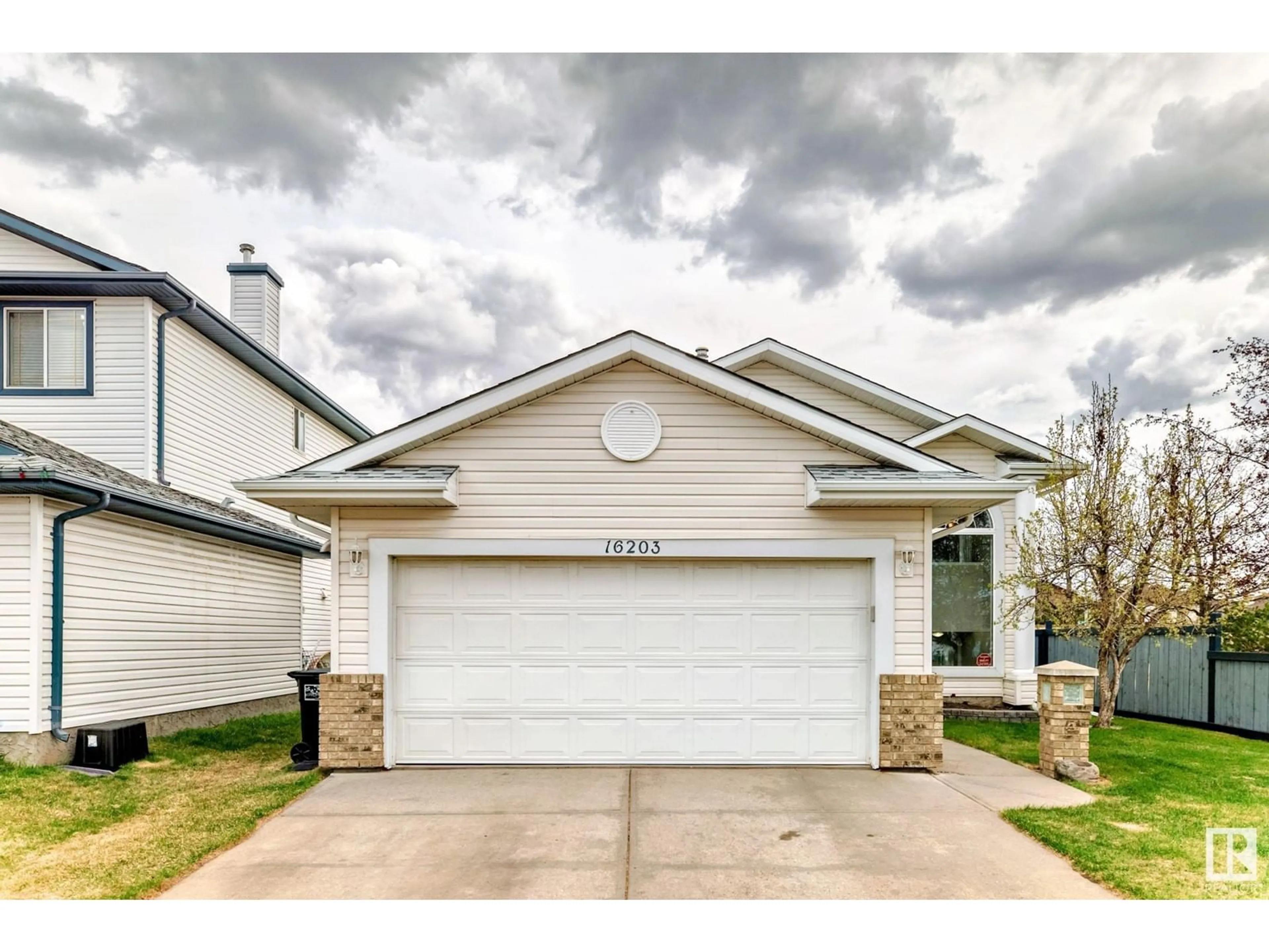 Home with vinyl exterior material, street for NW - 16203 83 ST, Edmonton Alberta T5Z3L5