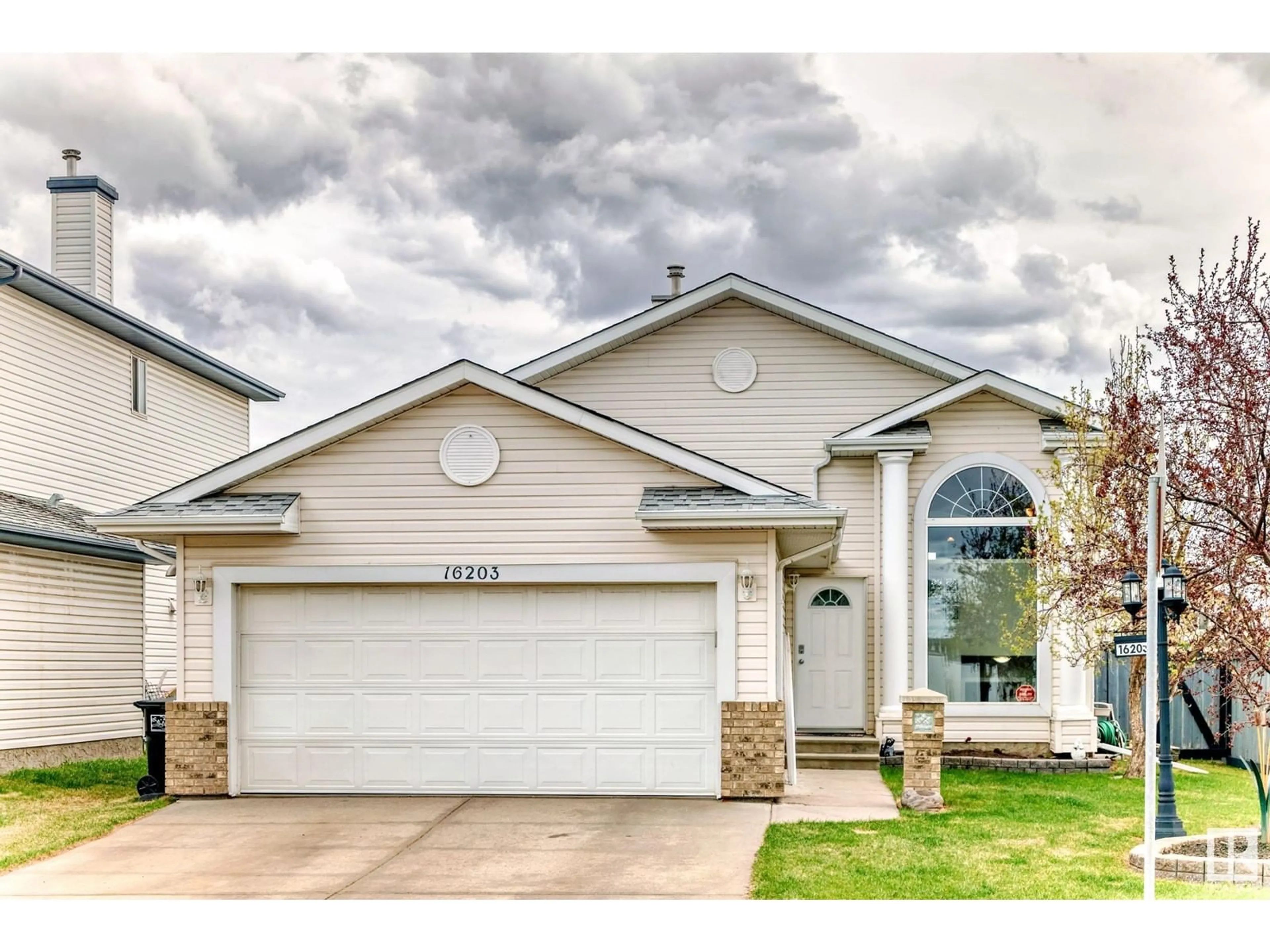 Home with vinyl exterior material, street for NW - 16203 83 ST, Edmonton Alberta T5Z3L5