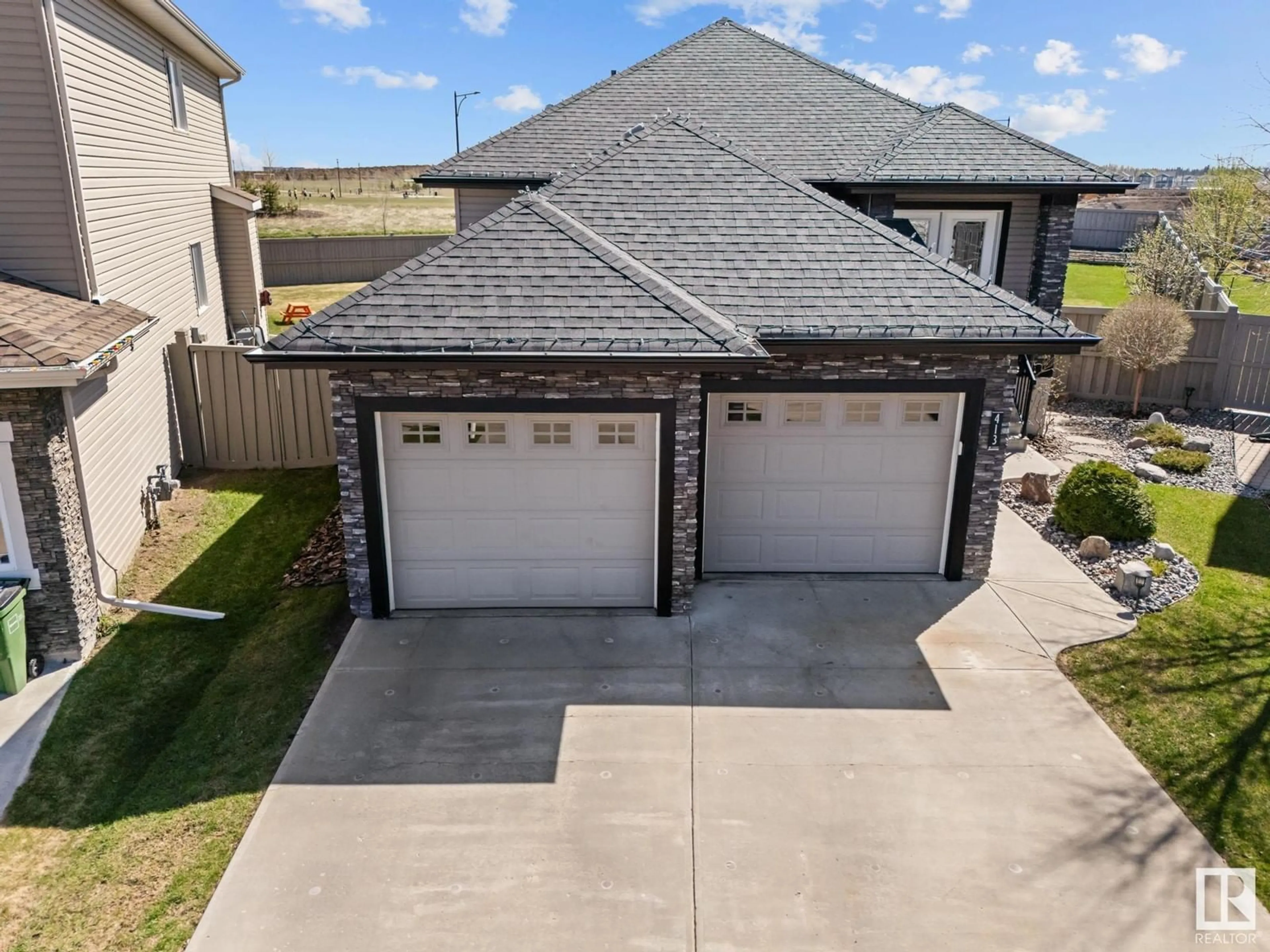 A pic from outside/outdoor area/front of a property/back of a property/a pic from drone, street for 413 CHAPPELLE DR, Edmonton Alberta T6W0Z3