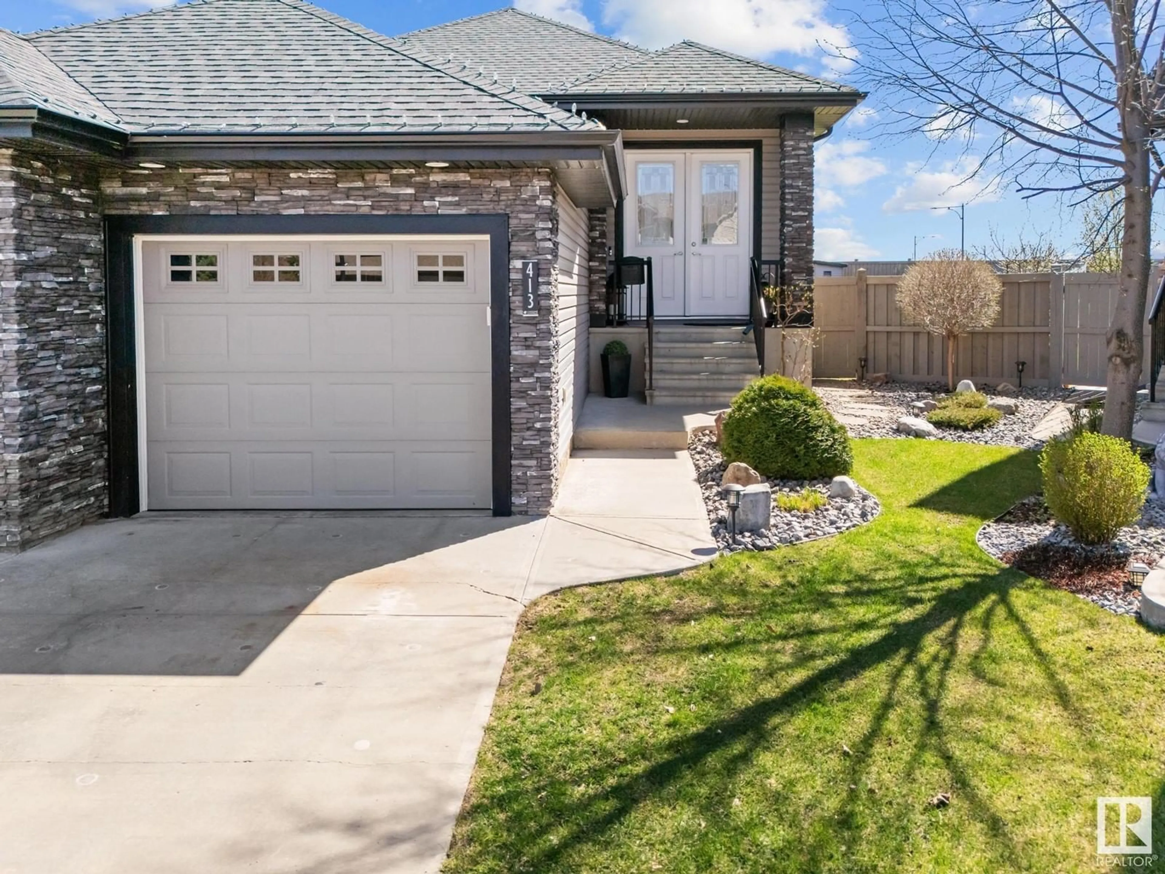 Home with brick exterior material, street for 413 CHAPPELLE DR, Edmonton Alberta T6W0Z3