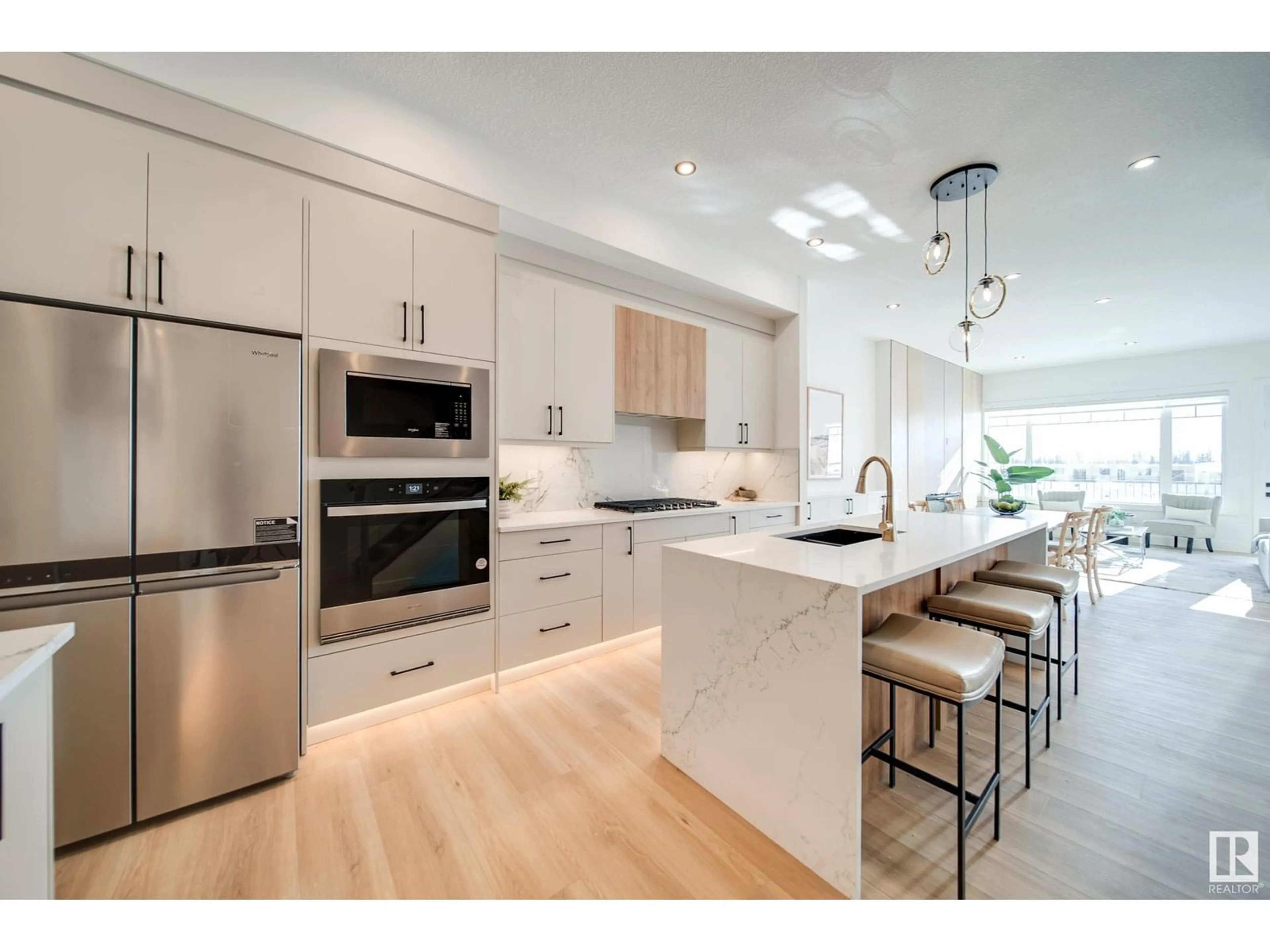 Open concept kitchen, wood/laminate floor for 17 STARLING, Fort Saskatchewan Alberta T8L1R5