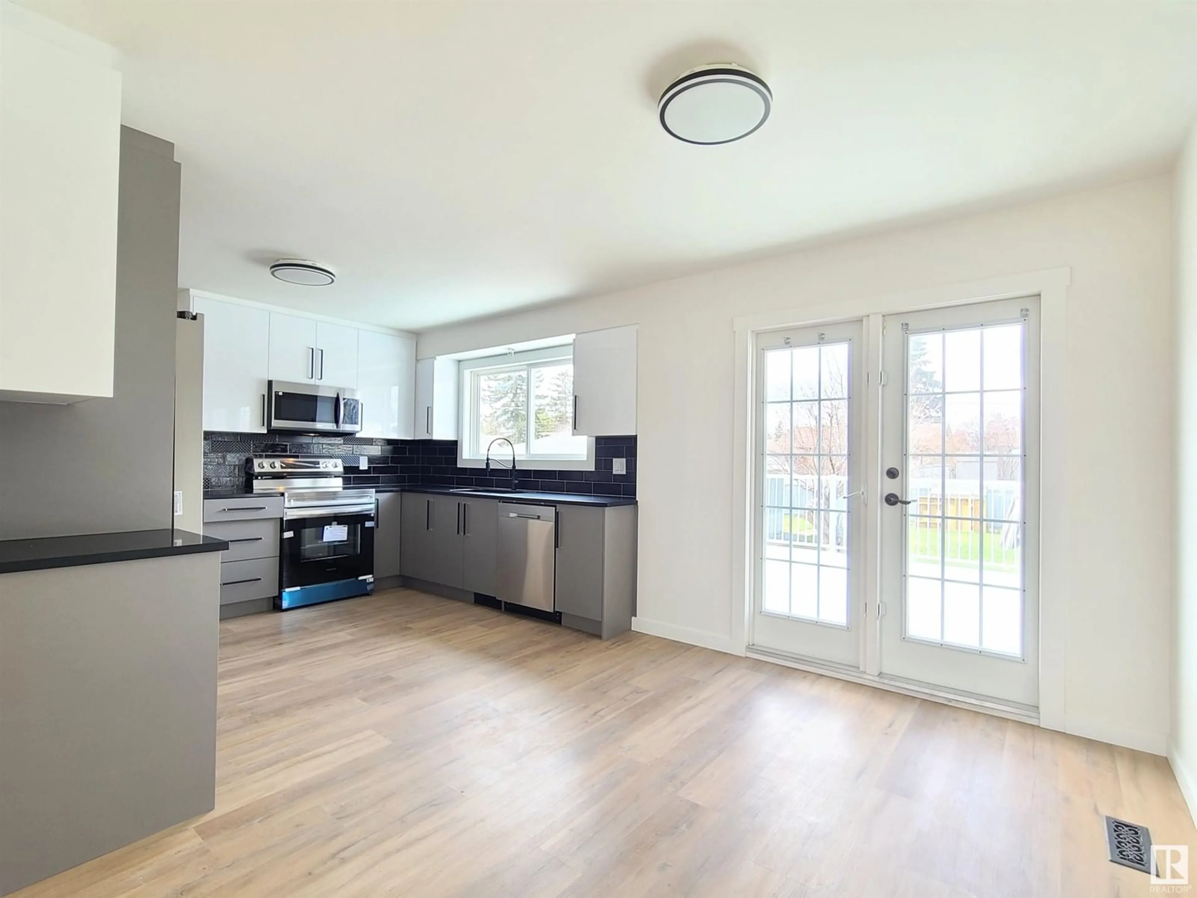 Open concept kitchen, unknown for NW - 12904 93 ST, Edmonton Alberta T5E3T2