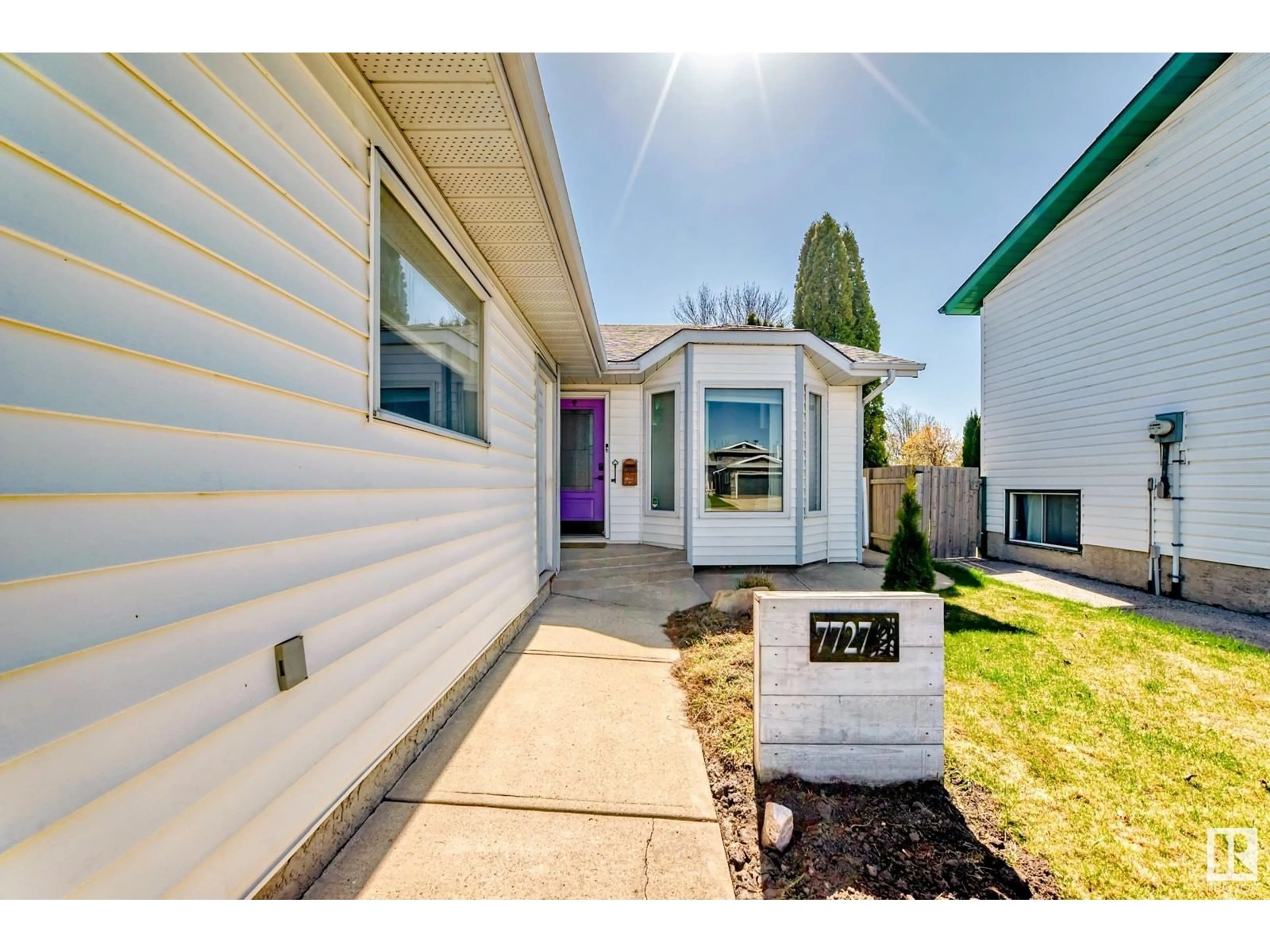 Home with vinyl exterior material, street for 7727 152B AV, Edmonton Alberta T5C3M3