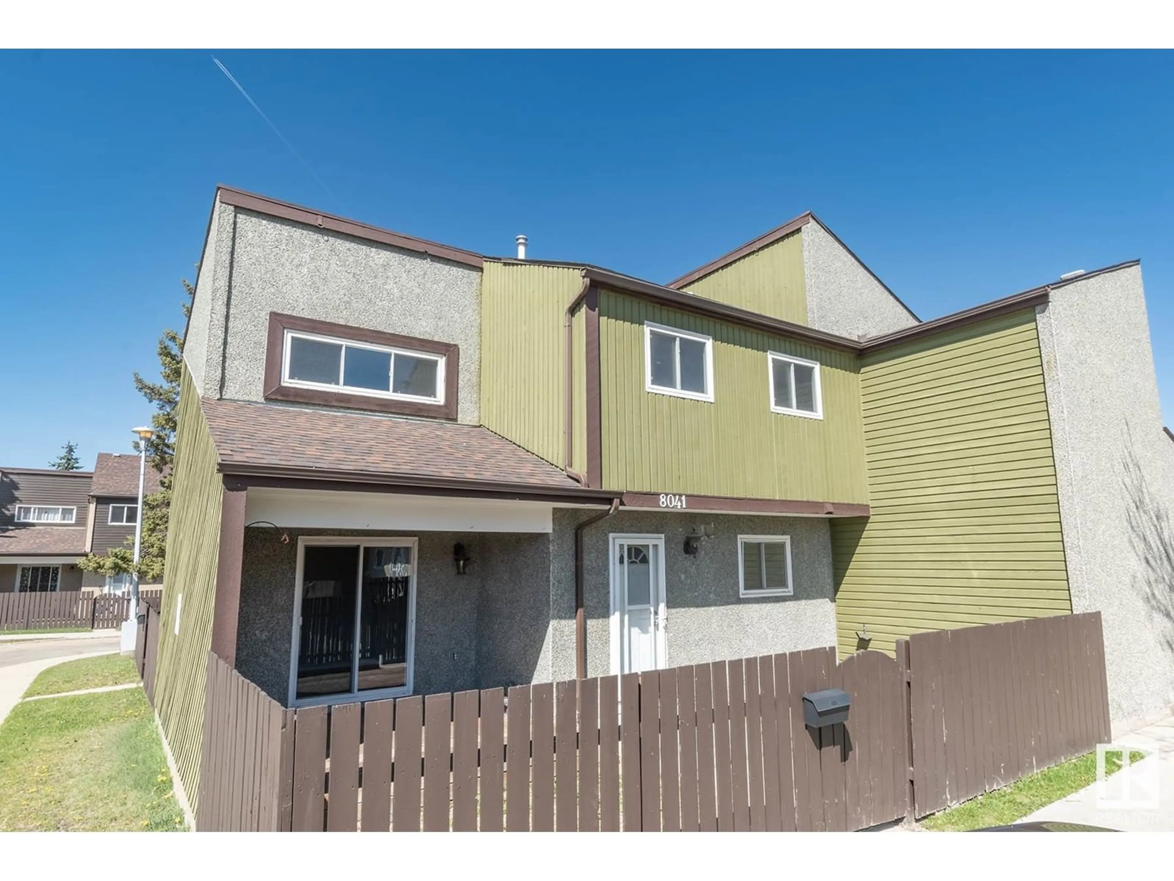 Home with vinyl exterior material, street for 8041 27 AV, Edmonton Alberta T6K3Z1