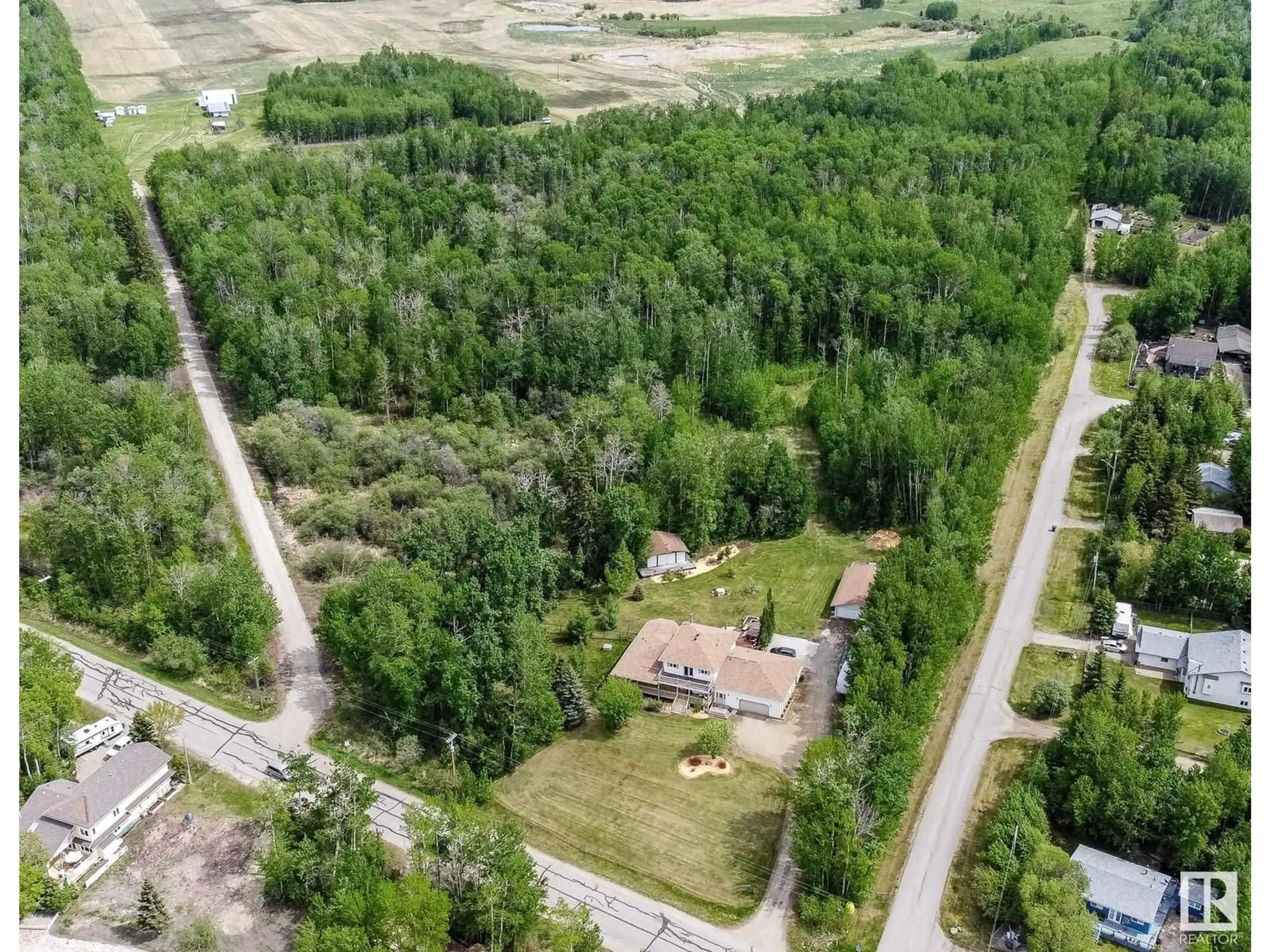 A pic from outside/outdoor area/front of a property/back of a property/a pic from drone, forest/trees view for 54431 STE ANNE TR, Rural Lac Ste. Anne County Alberta T0E0A0