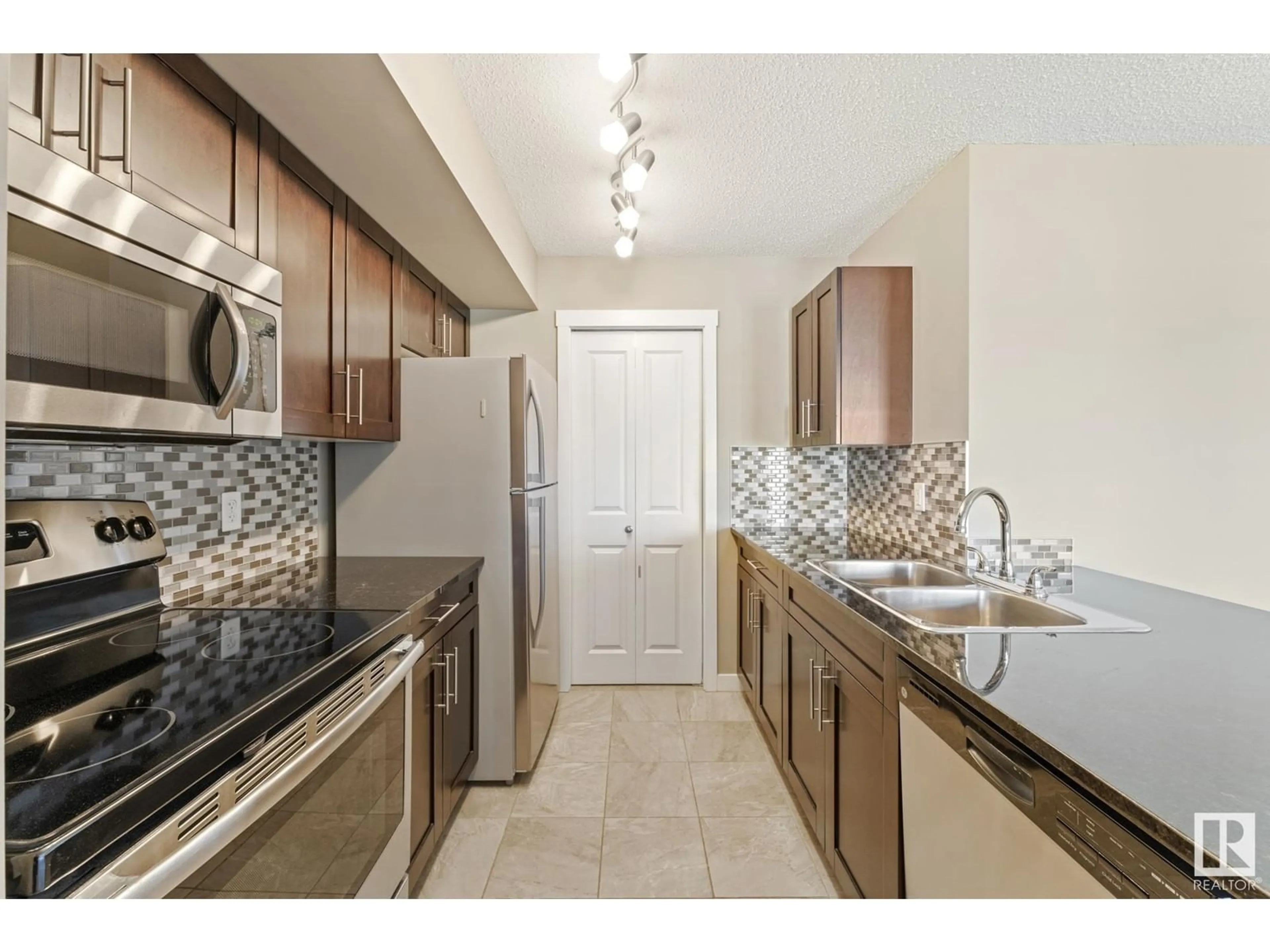 Standard kitchen, unknown for #313 - 5810 MULLEN PL, Edmonton Alberta T6R0W3