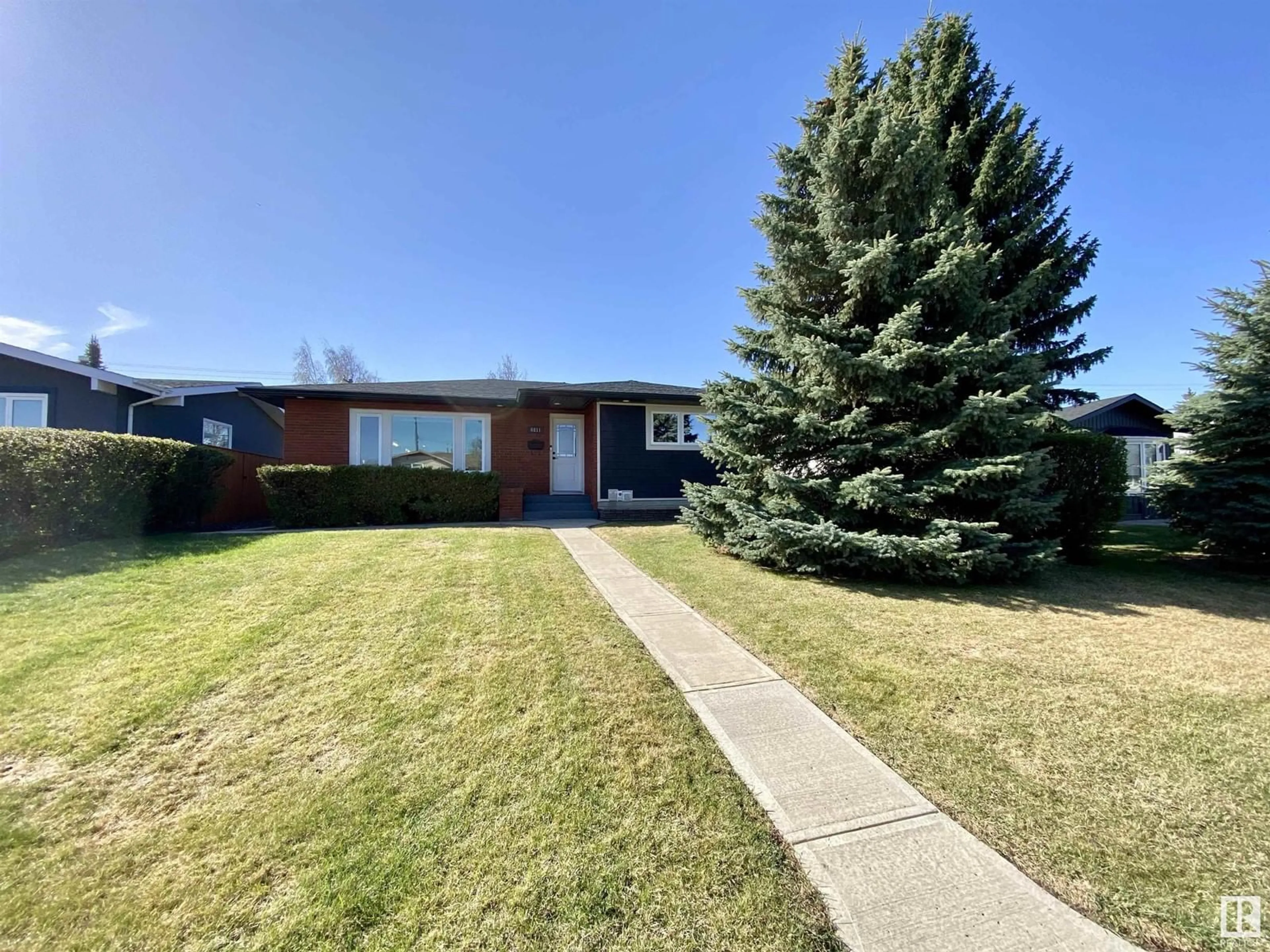 A pic from outside/outdoor area/front of a property/back of a property/a pic from drone, street for 6811 98A AV, Edmonton Alberta T6A0B9