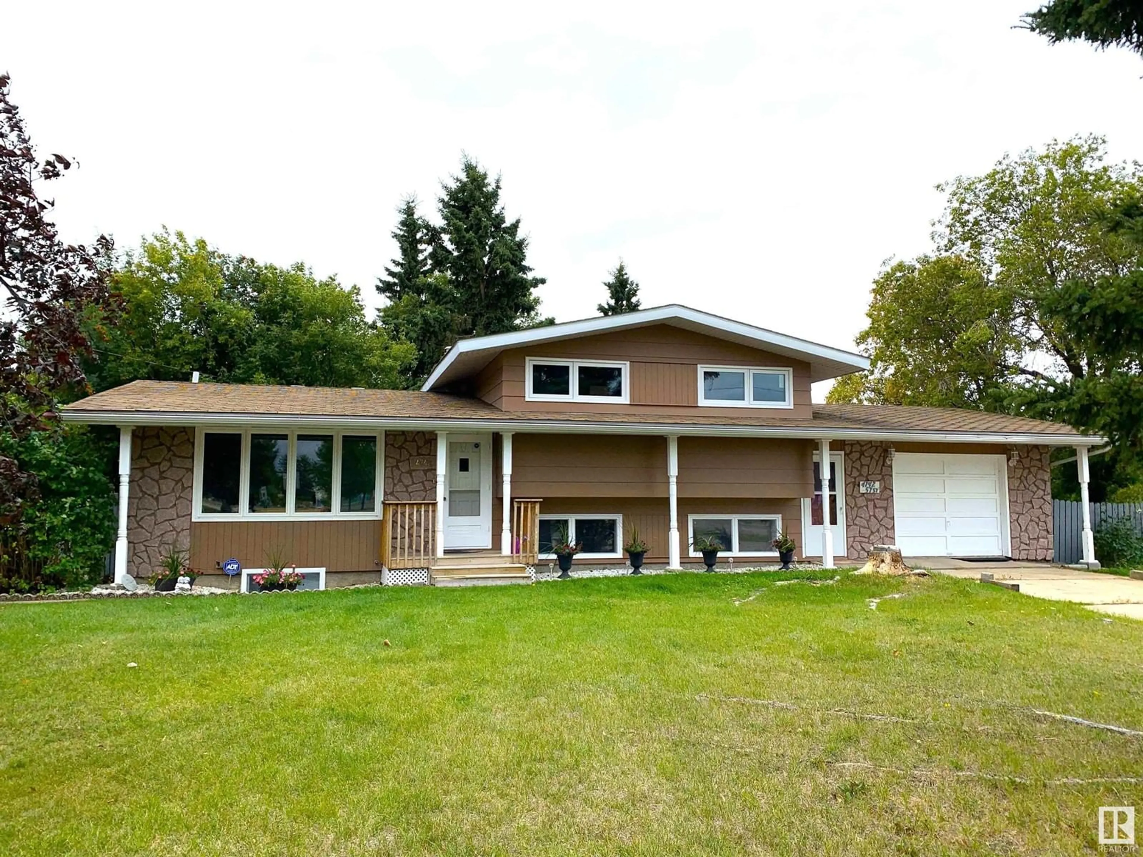 Home with vinyl exterior material, street for 4742 57 ST, Cold Lake Alberta T9M1V1