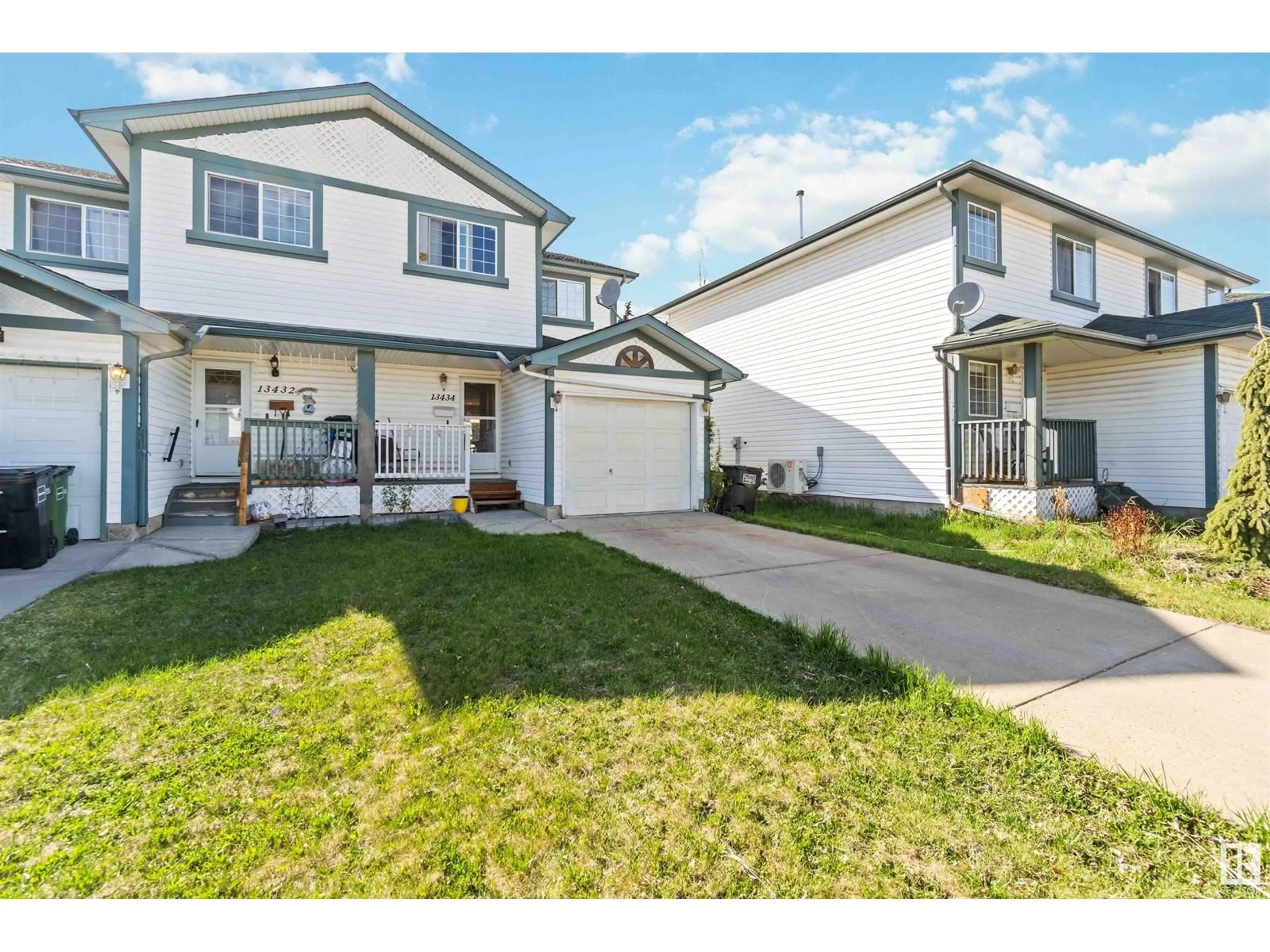 Home with vinyl exterior material, street for NW - 13434 33 ST, Edmonton Alberta T5A5C1