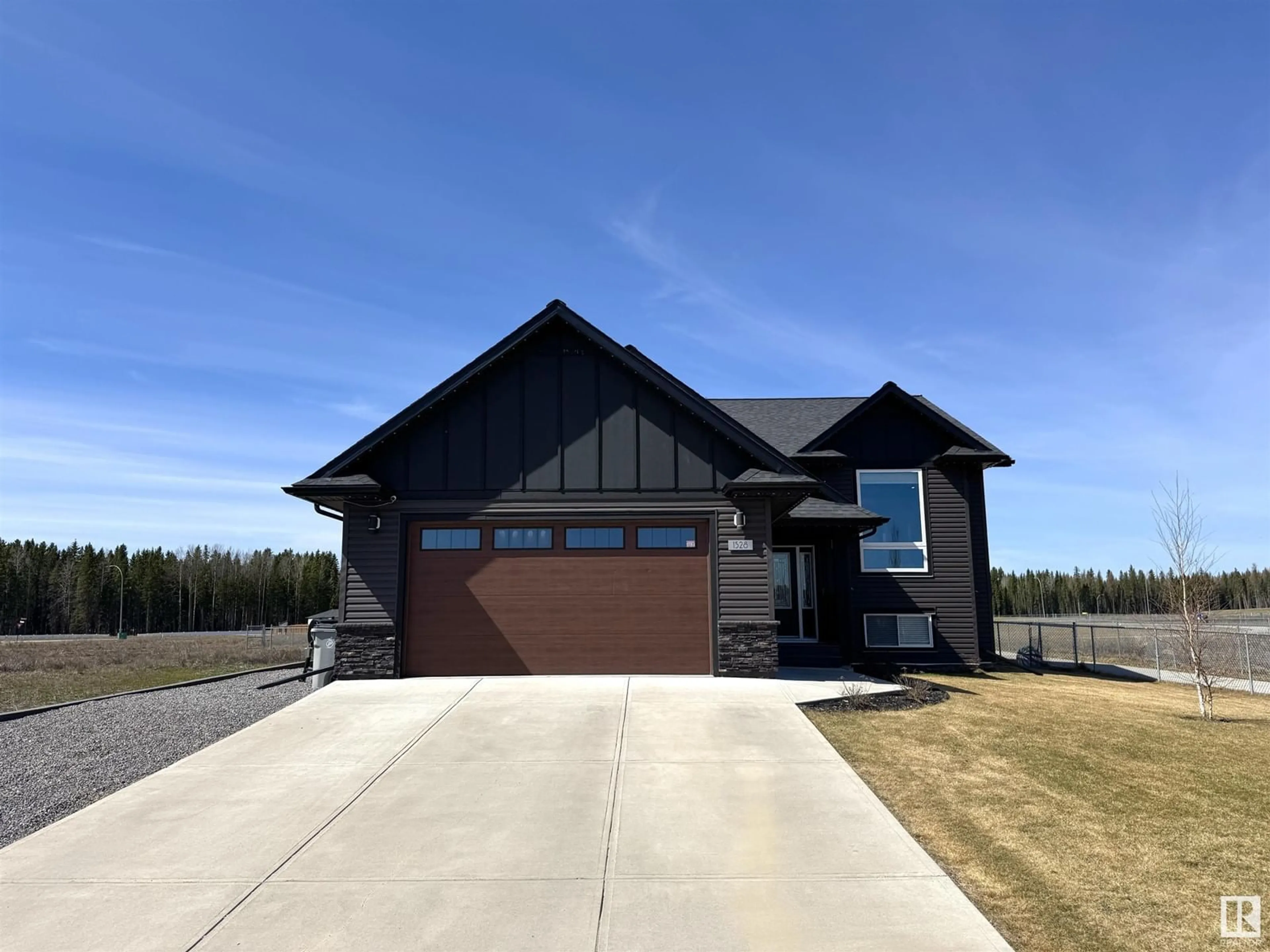 Home with brick exterior material, street for 1528 43 ST, Edson Alberta T7E0A5
