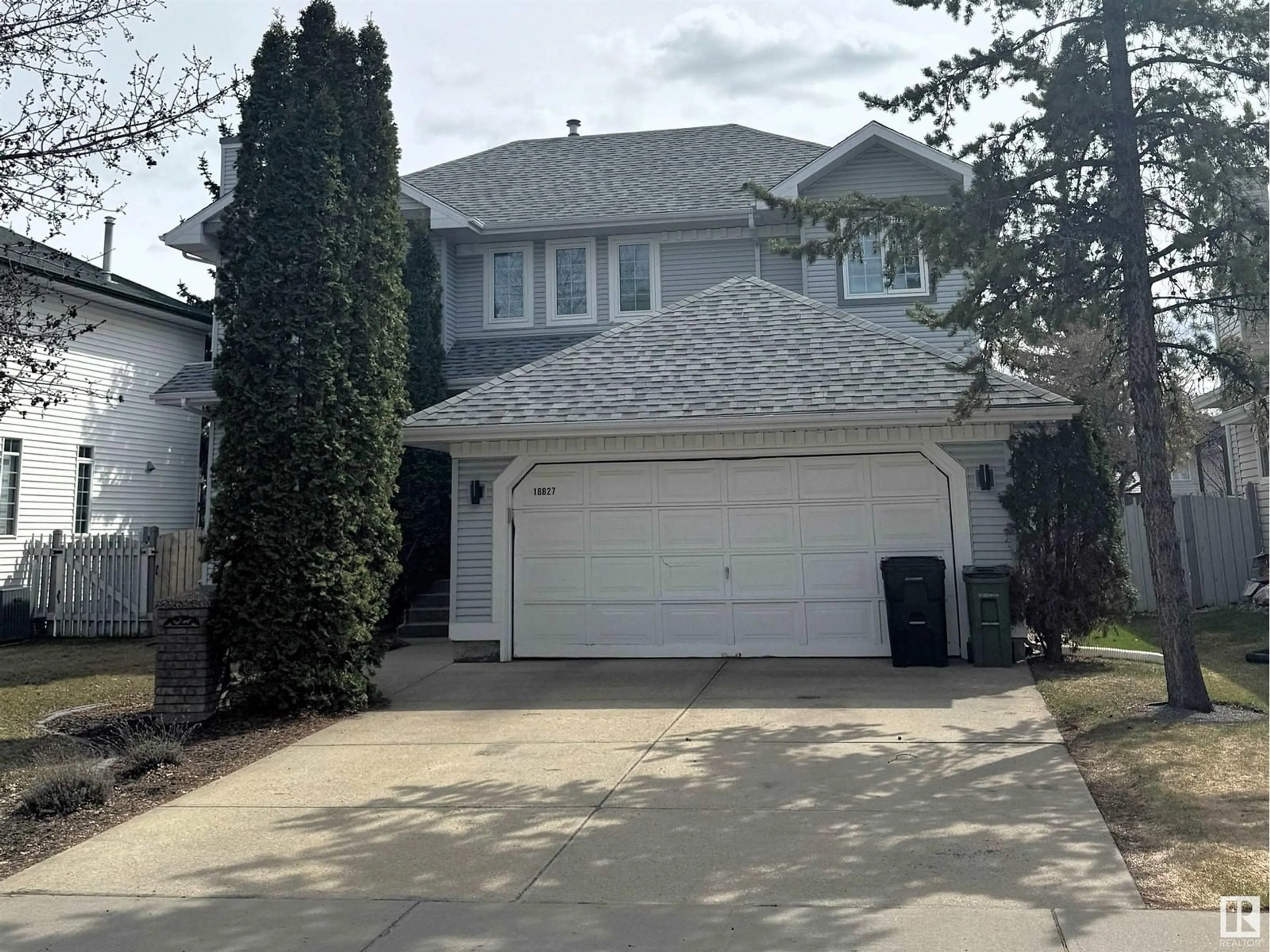 Home with vinyl exterior material, street for 18827 51 AV, Edmonton Alberta T6M2K9