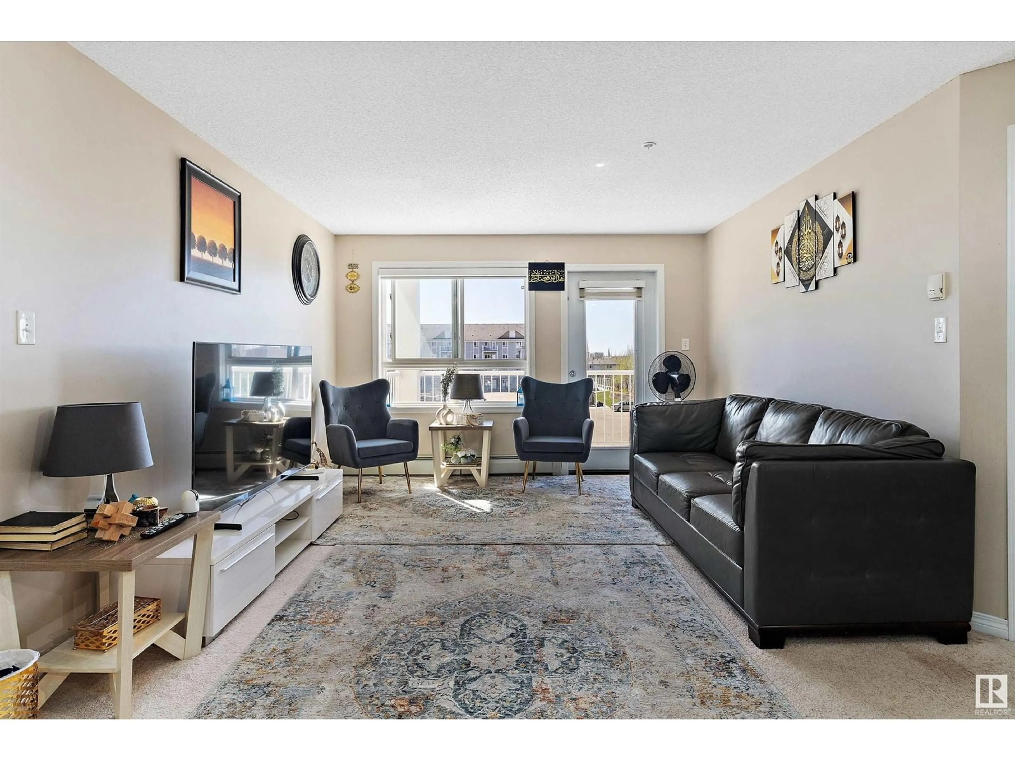 Living room with furniture, unknown for 5350 - 316 199 ST, Edmonton Alberta T6M0A5