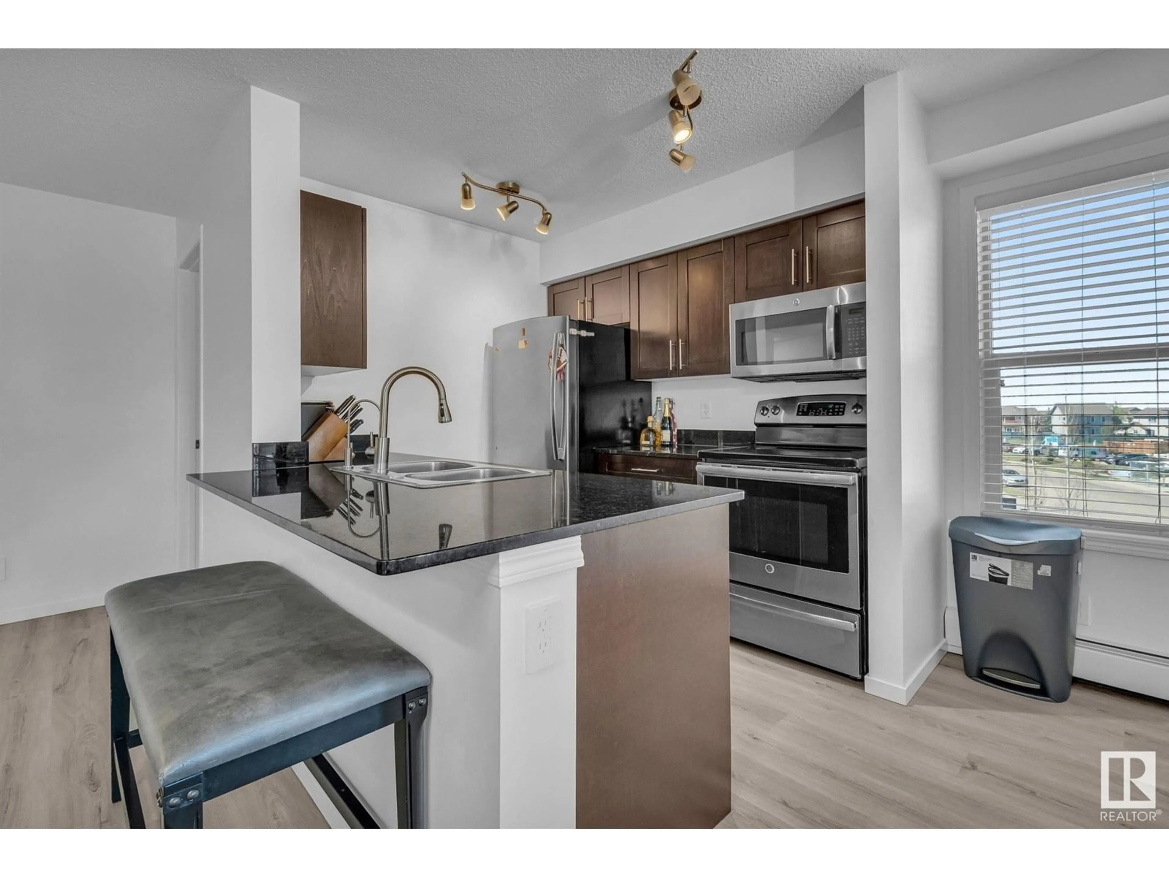 Open concept kitchen, unknown for 302 12025 22 AVE SW, Edmonton Alberta T6W2Y1