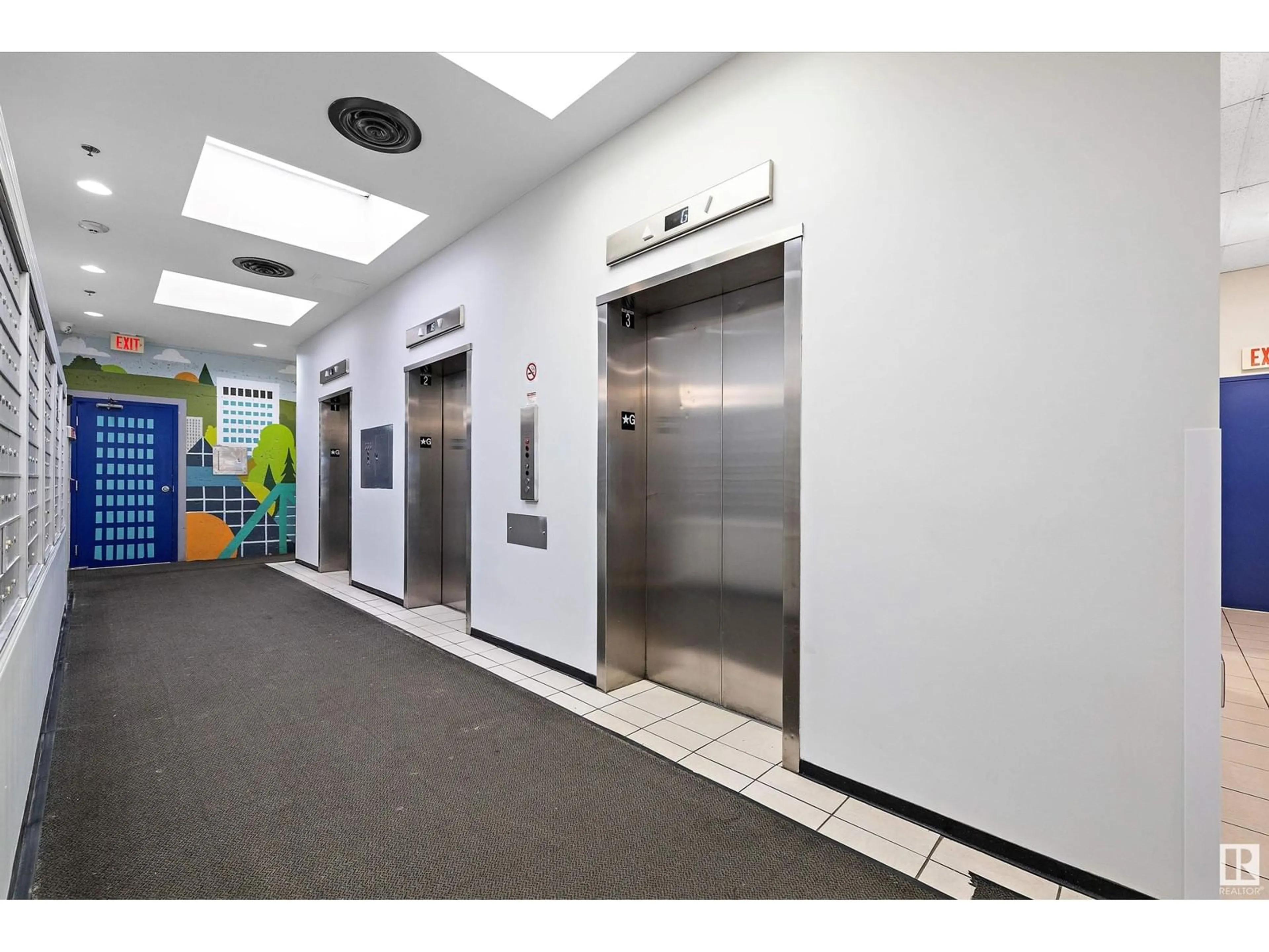 Indoor foyer for 1810 JASPER AV, Edmonton Alberta T5J1R9