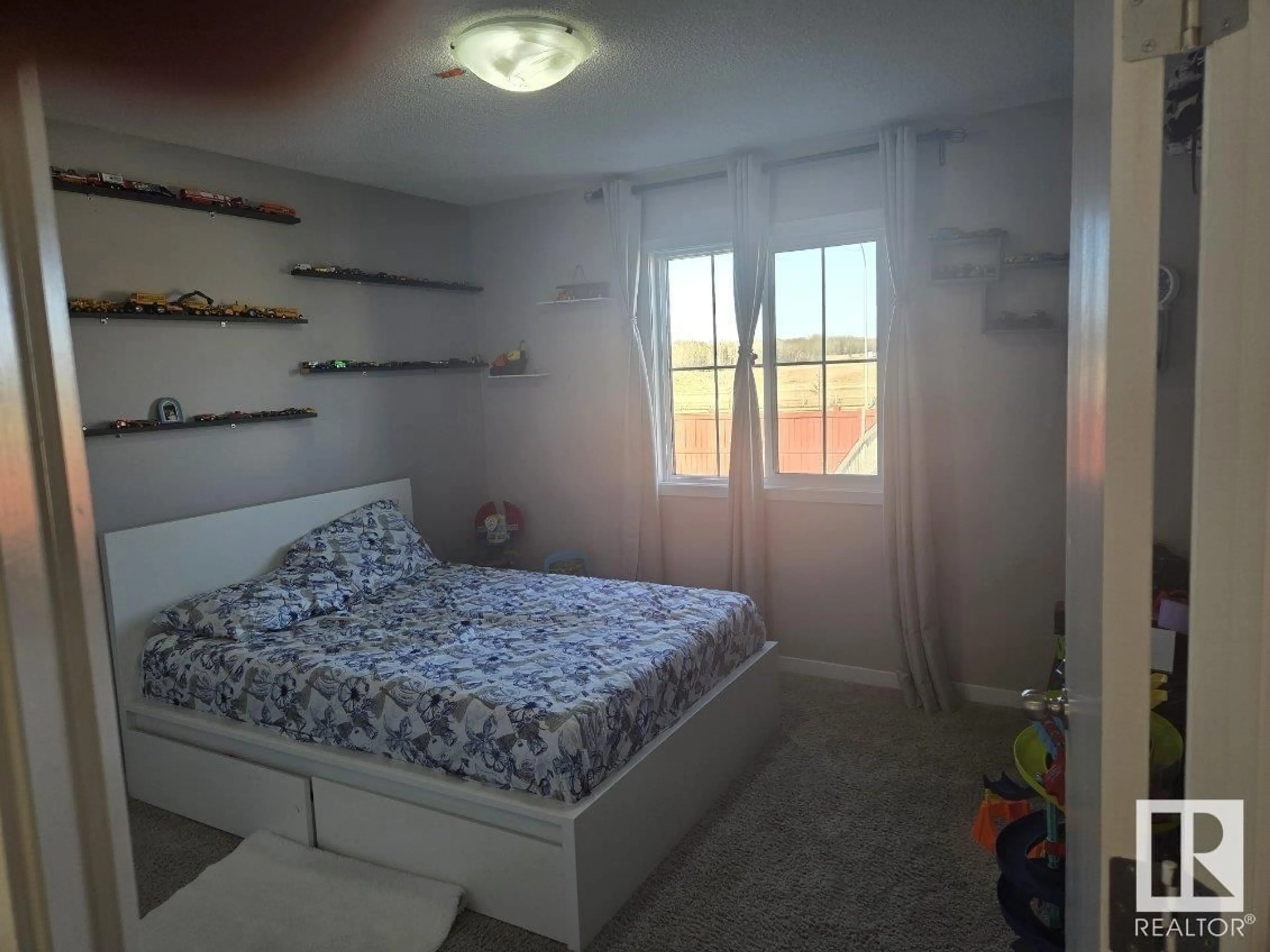 Bedroom with bed, unknown for SW - 1947 51 ST, Edmonton Alberta T6X1A4