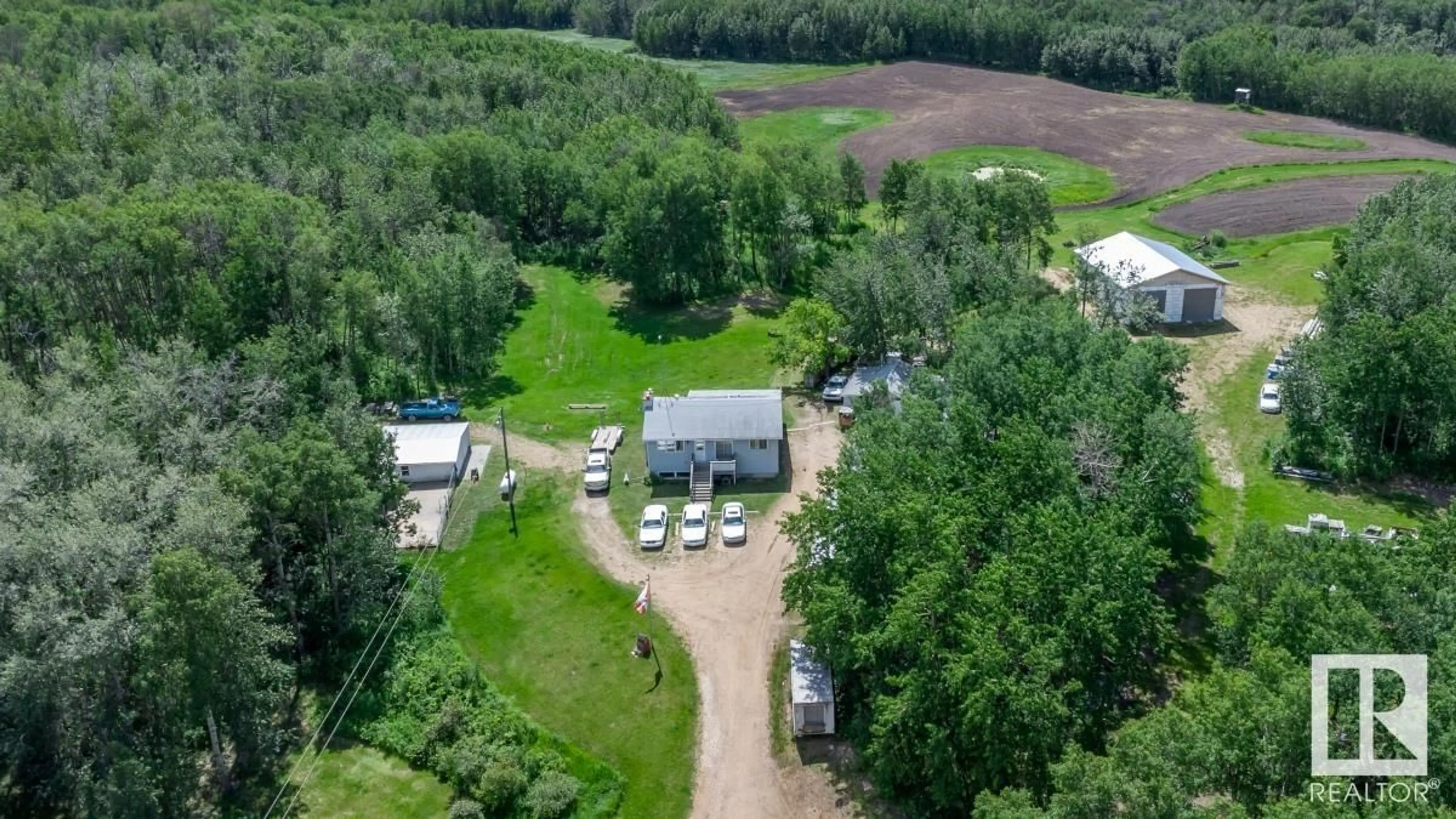 A pic from outside/outdoor area/front of a property/back of a property/a pic from drone, unknown for 50116 RANGE ROAD 202, Rural Beaver County Alberta T0B4J2