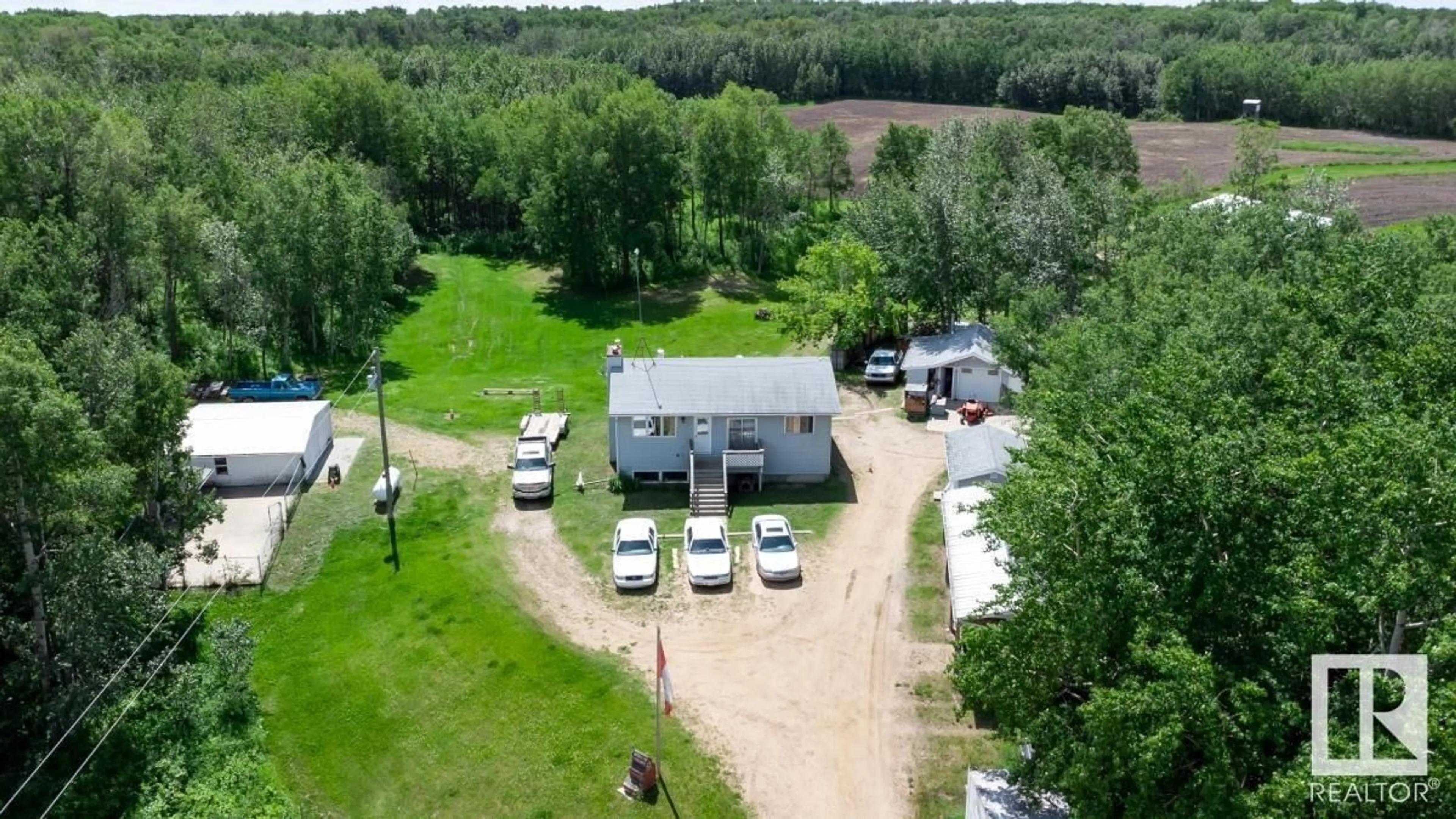 A pic from outside/outdoor area/front of a property/back of a property/a pic from drone, unknown for 50116 RANGE ROAD 202, Rural Beaver County Alberta T0B4J2