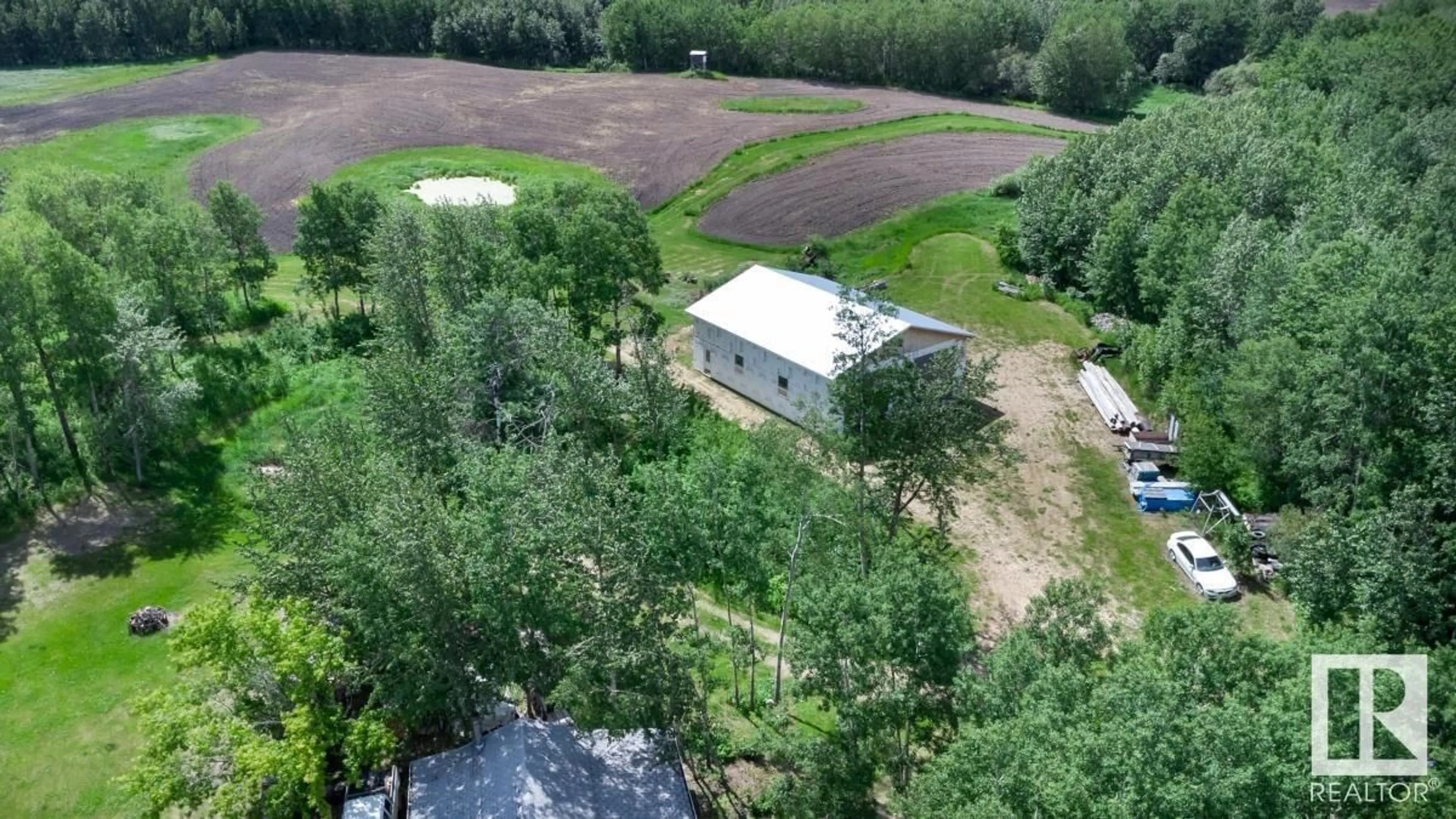 A pic from outside/outdoor area/front of a property/back of a property/a pic from drone, unknown for 50116 RANGE ROAD 202, Rural Beaver County Alberta T0B4J2