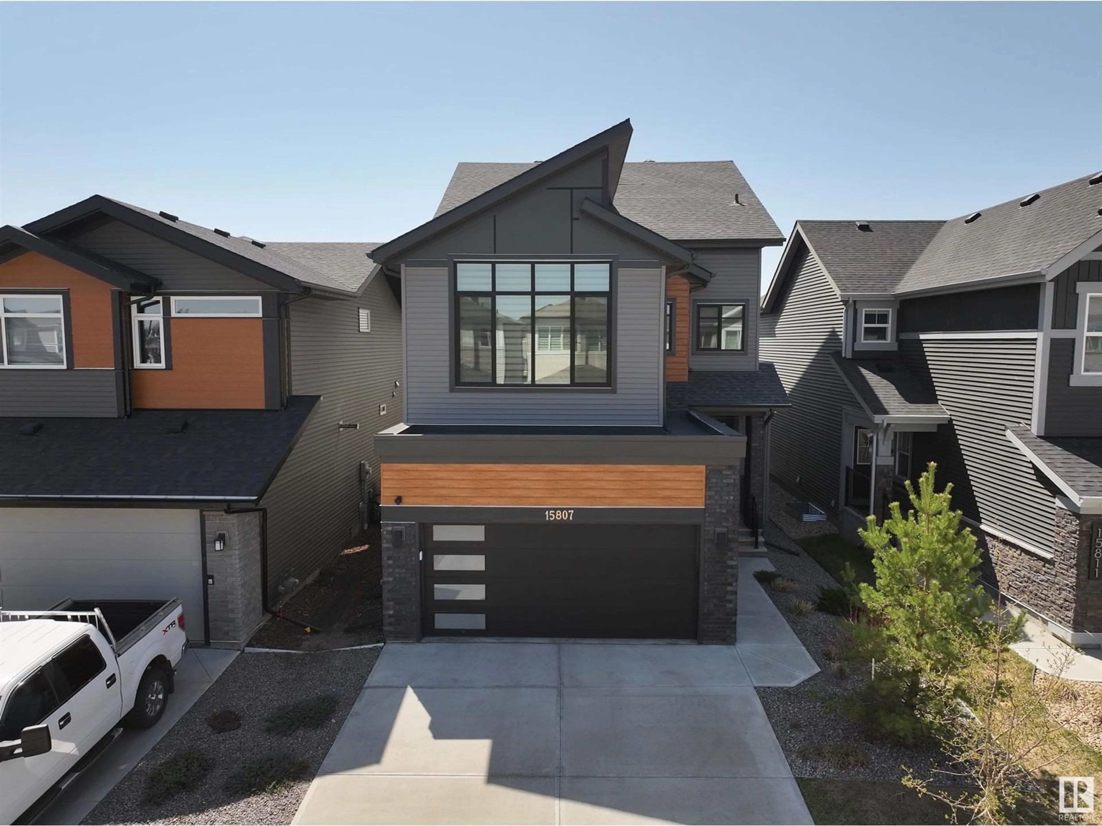 Home with brick exterior material, street for SW - 15807 30 AV, Edmonton Alberta T6W4X3