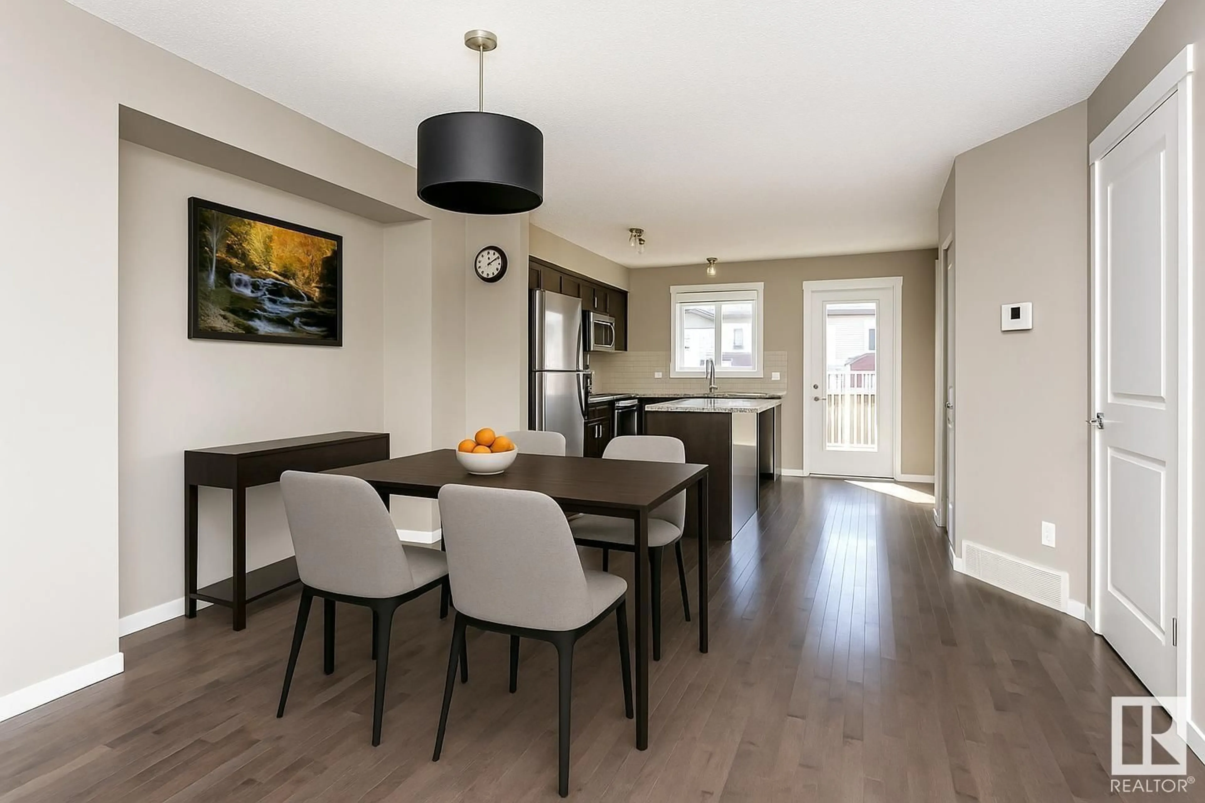 Dining room, wood/laminate floor for SW - 5239 20 AV, Edmonton Alberta T6X1V5