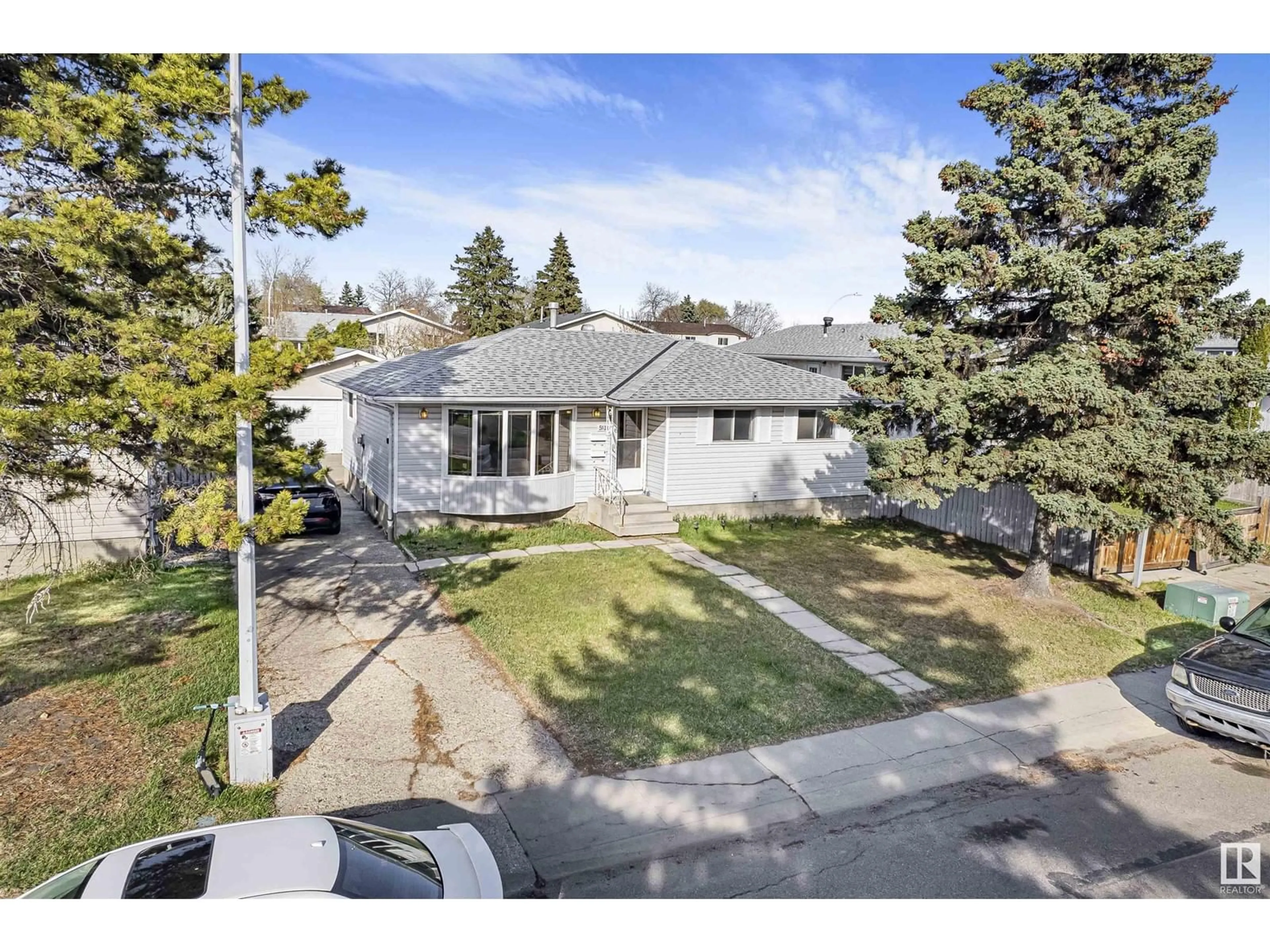 A pic from outside/outdoor area/front of a property/back of a property/a pic from drone, street for NW - 5510 145A AV, Edmonton Alberta T5A2S1