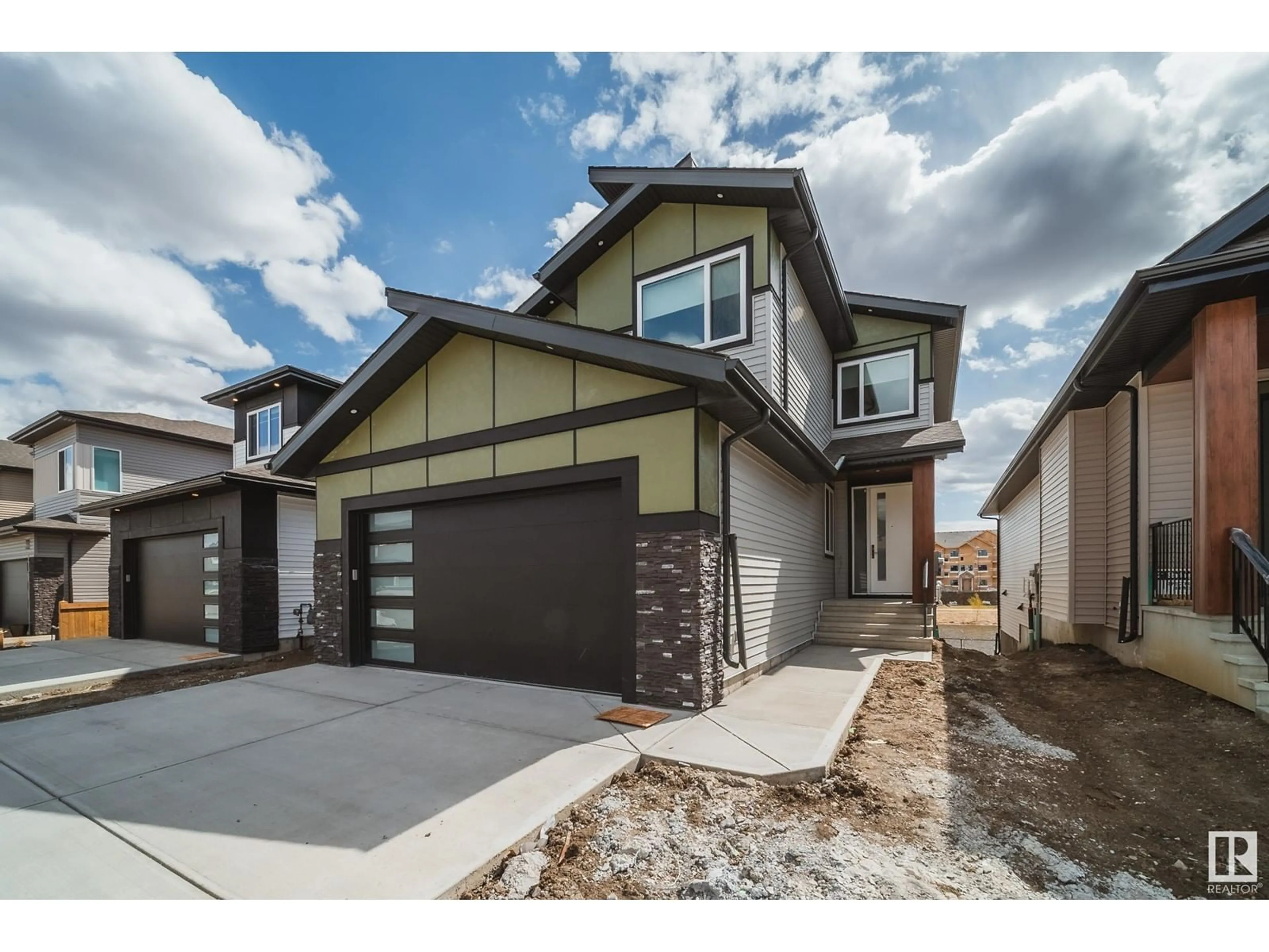 Home with brick exterior material, street for 25 STARLING WY, Fort Saskatchewan Alberta T8L1R5
