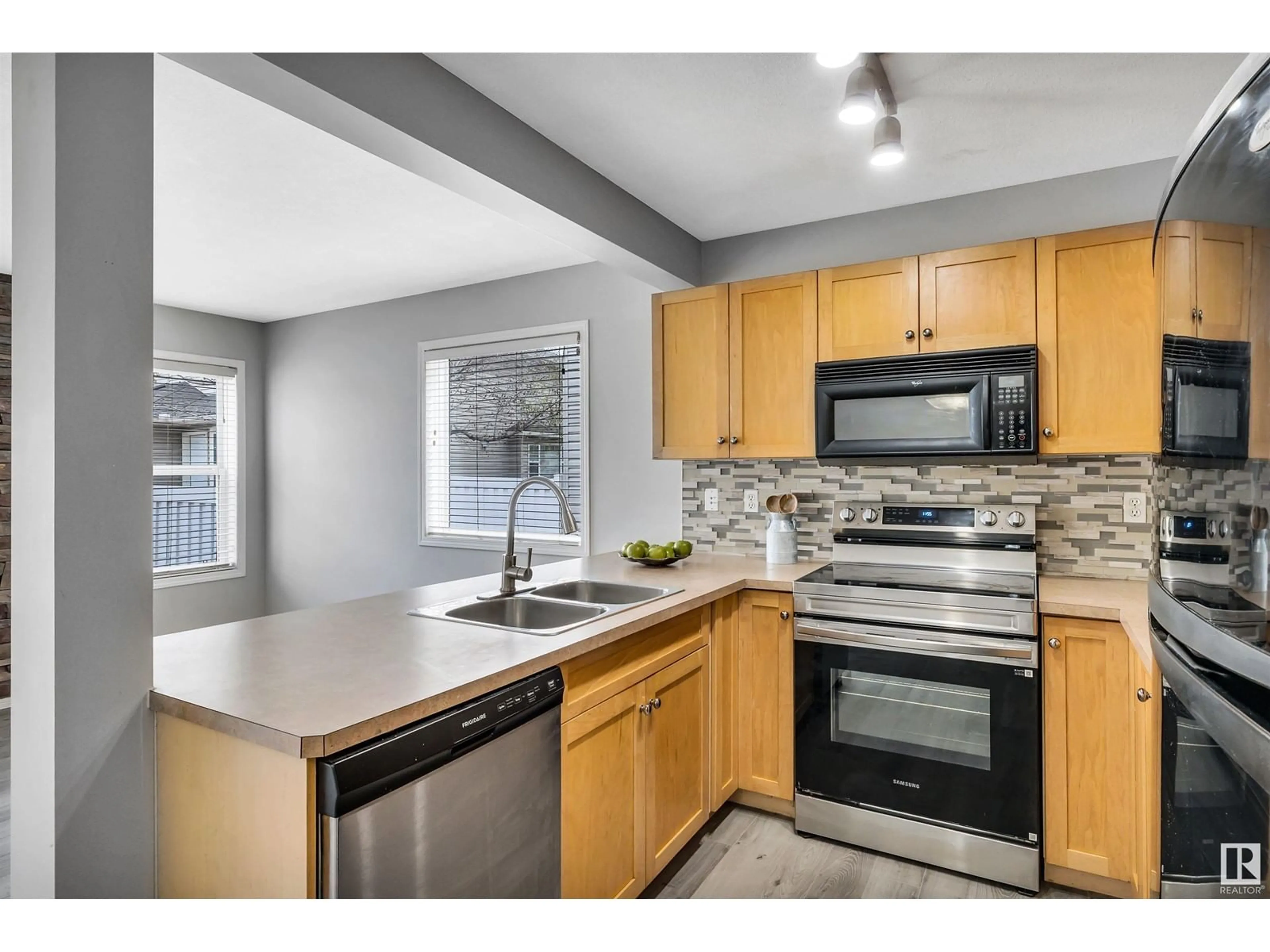Standard kitchen, ceramic/tile floor for #100 - 230 EDWARDS DR, Edmonton Alberta T6X1G7